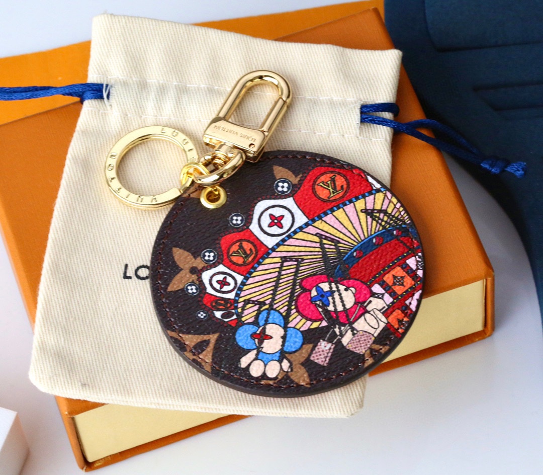 Close up of the sunny flower design on the leather keychain