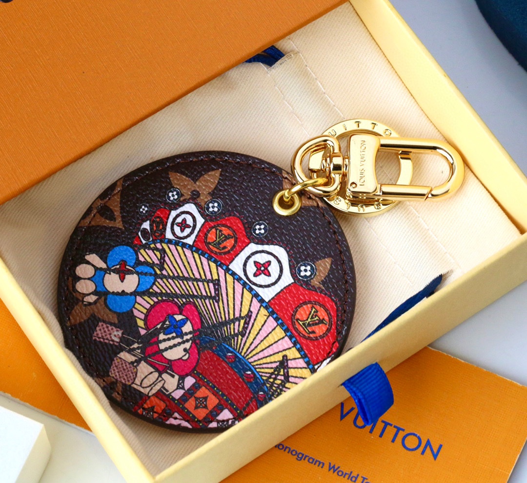 Back view of the leather keychain showing gold hardware and attachment ring