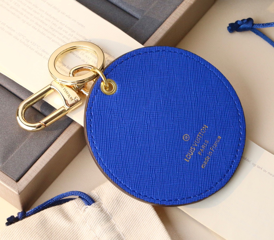 Close-up of keychain in hand.