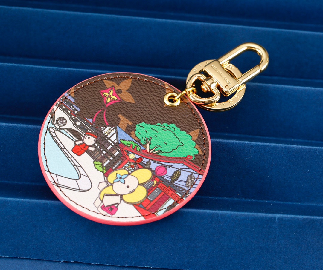 Close up of the sunny flower design on the leather keychain