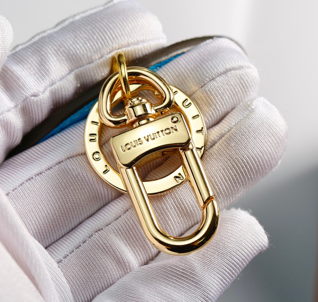 Model holding Leather keychain