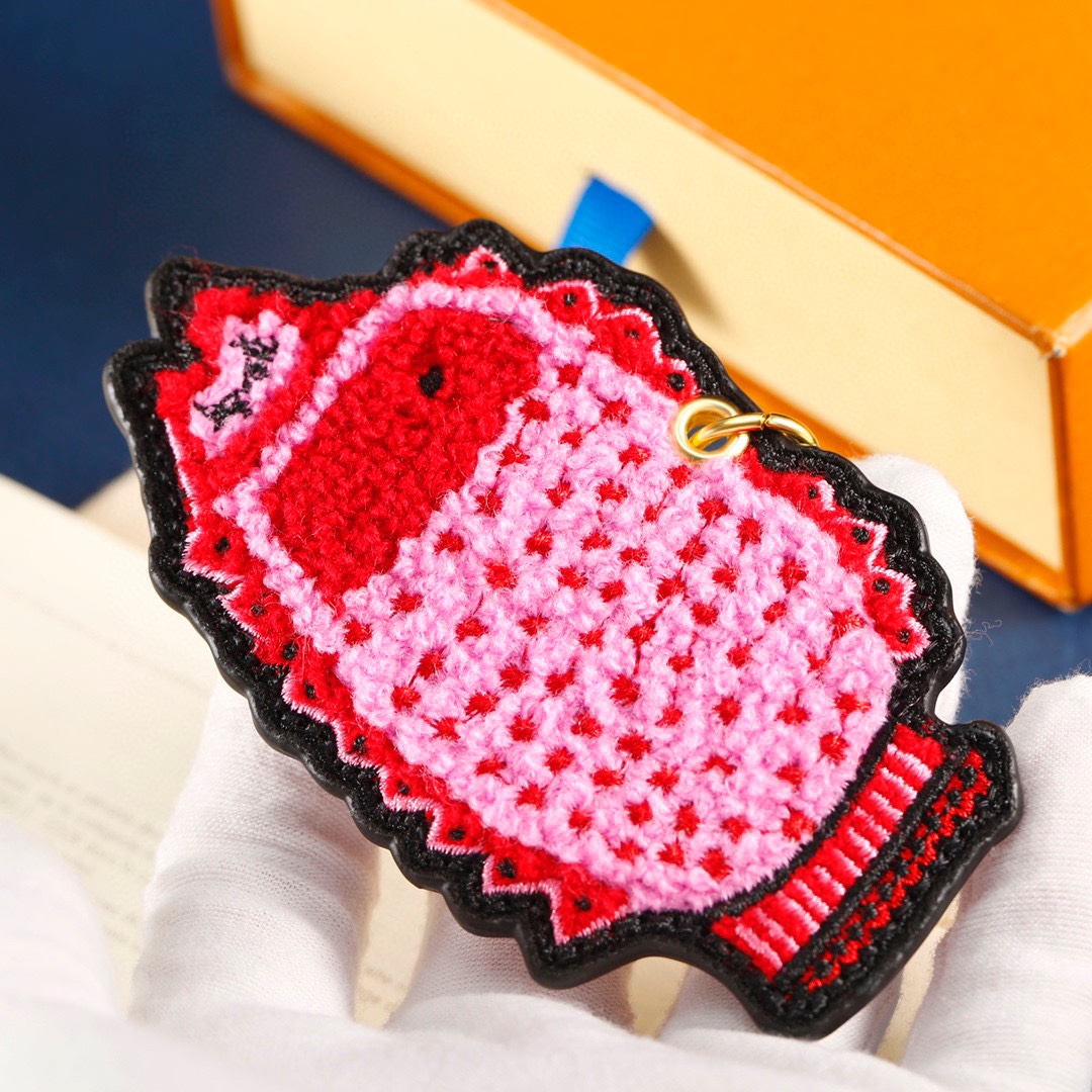 Crochet pink fish keychain front view