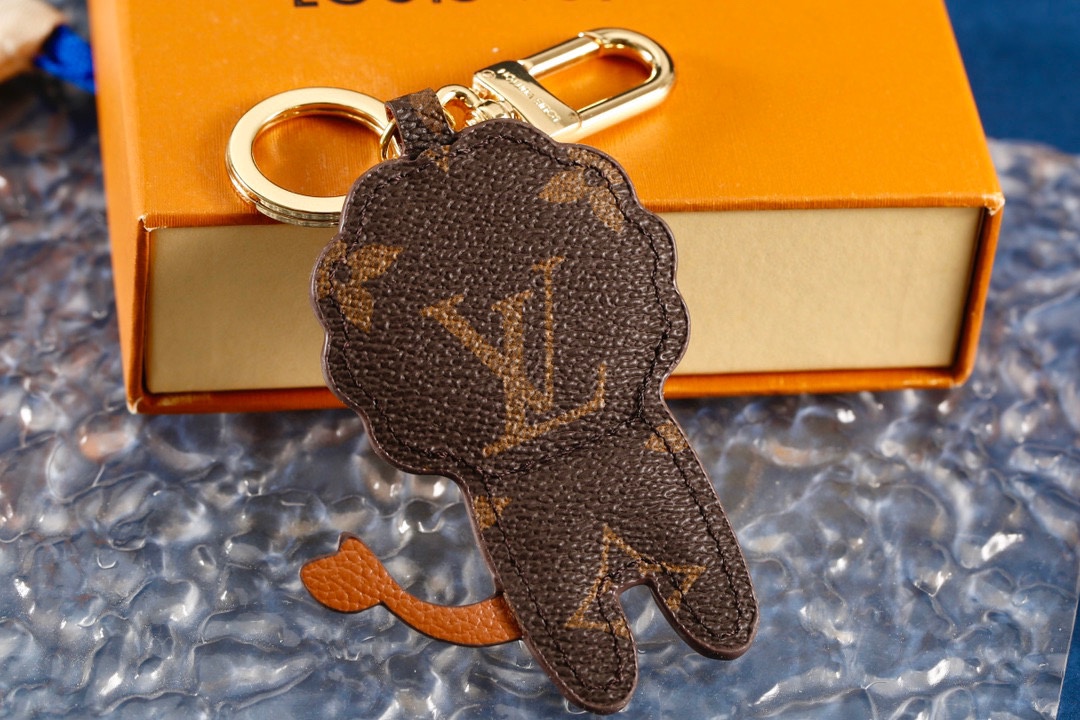 Leather Lion Keychain in packaging