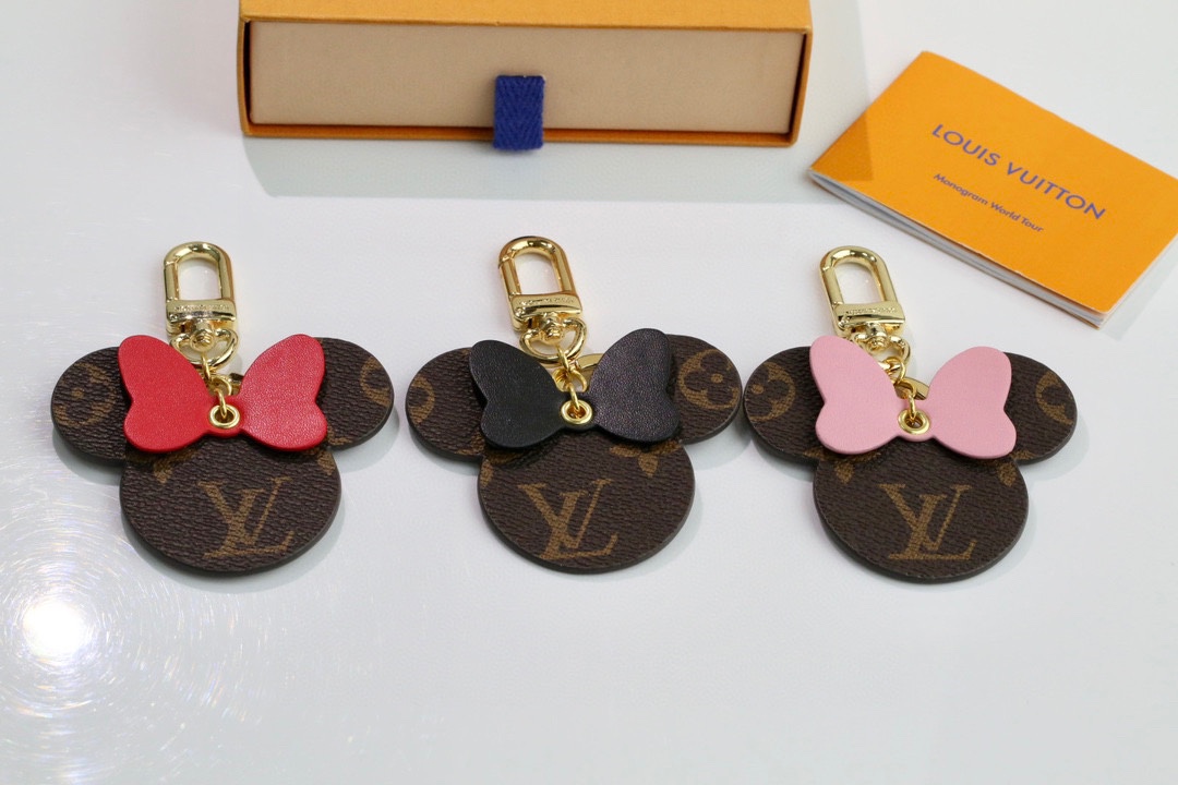 Mickey Mouse keychain with coffee colored head and bow