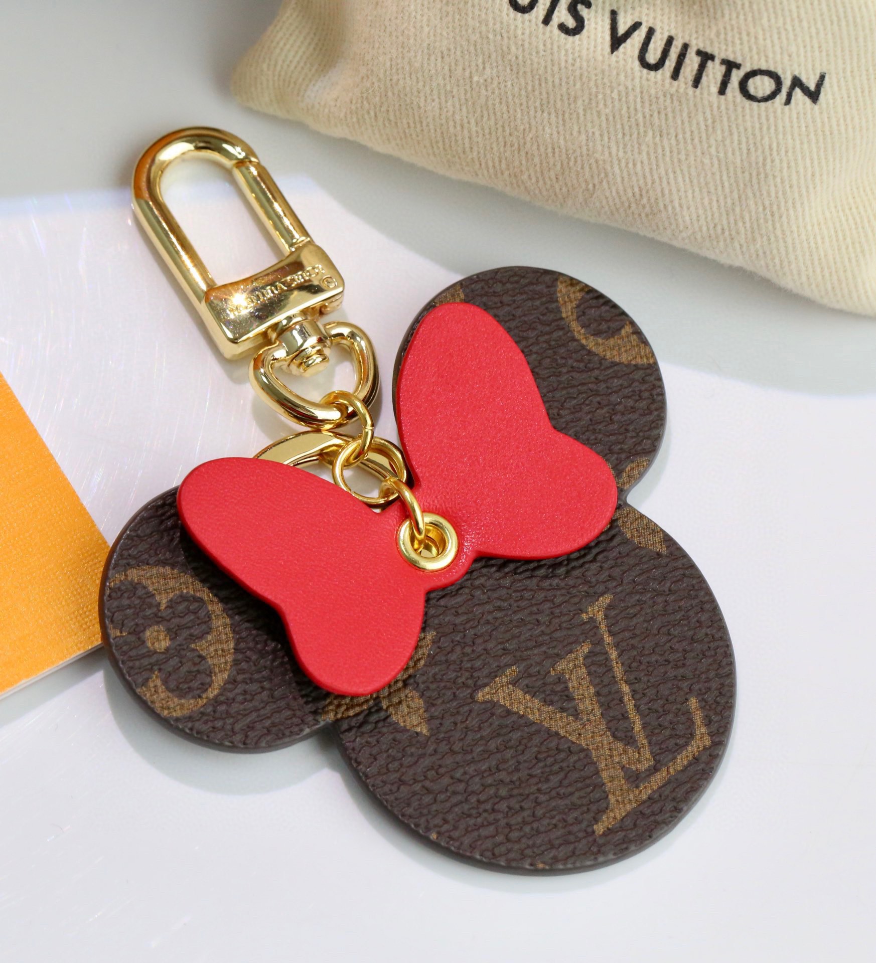 Black back with gold clasp Mickey Mouse keychain