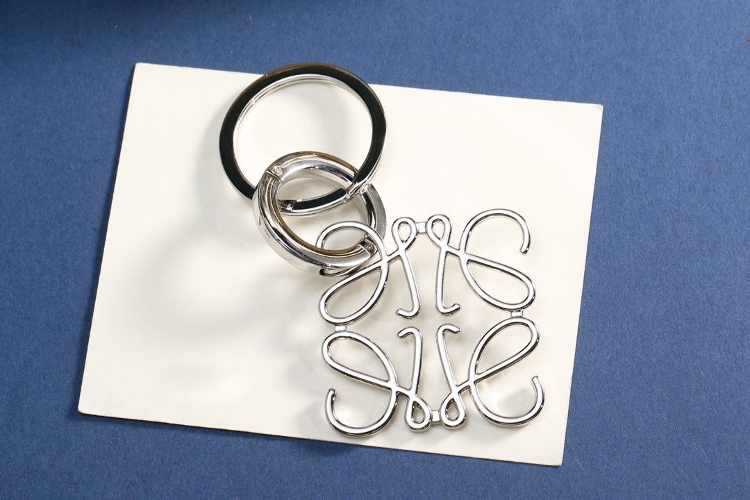 “Innovative 95-Lowell Key Buttons for Bag Security and Style” - 图片 5