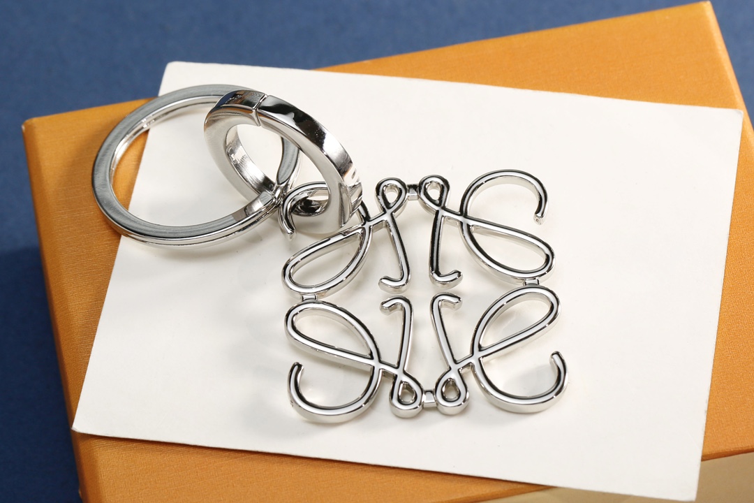 “Innovative 95-Lowell Key Buttons for Bag Security and Style” - 图片 6