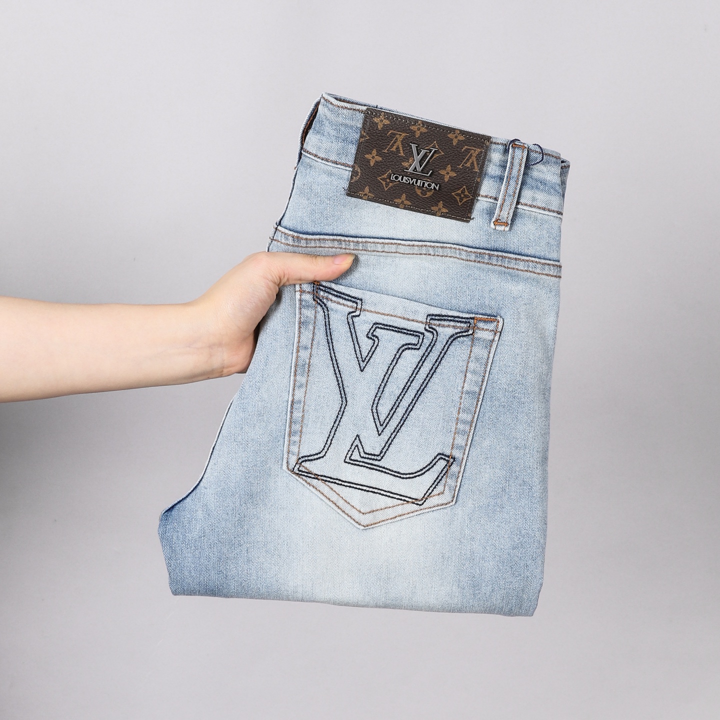 Louis Vuitton Men's Slim-Fit Light Wash Denim Jeans with Logo Detail 2 i1746030036643 3898 0 0