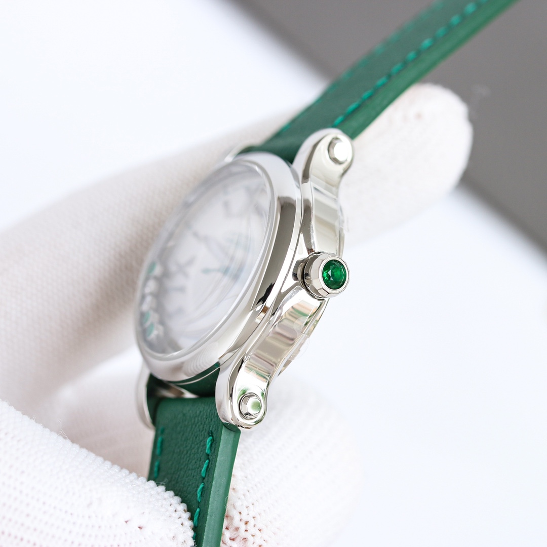 萧邦全新限量款全新的快乐钻happySport系列33mm限量款款白色玑镂饰纹表盘搭配醒目的绿色小秒针表