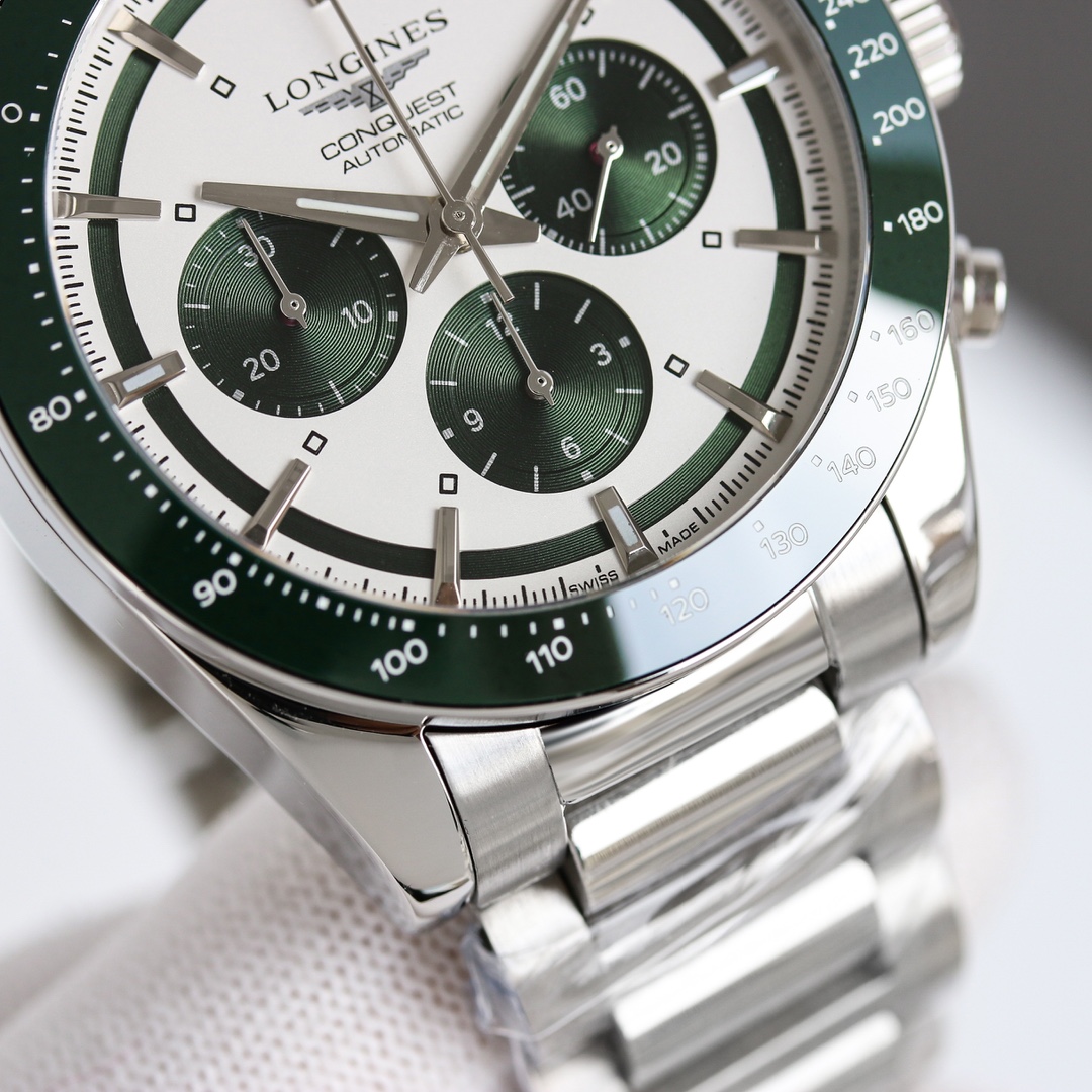 Longines Conquest Chronograph L3.835.4.02.6 stainless steel case and bracelet, green-black bezel, silver dial with green subdials 42mm Men's Automatic