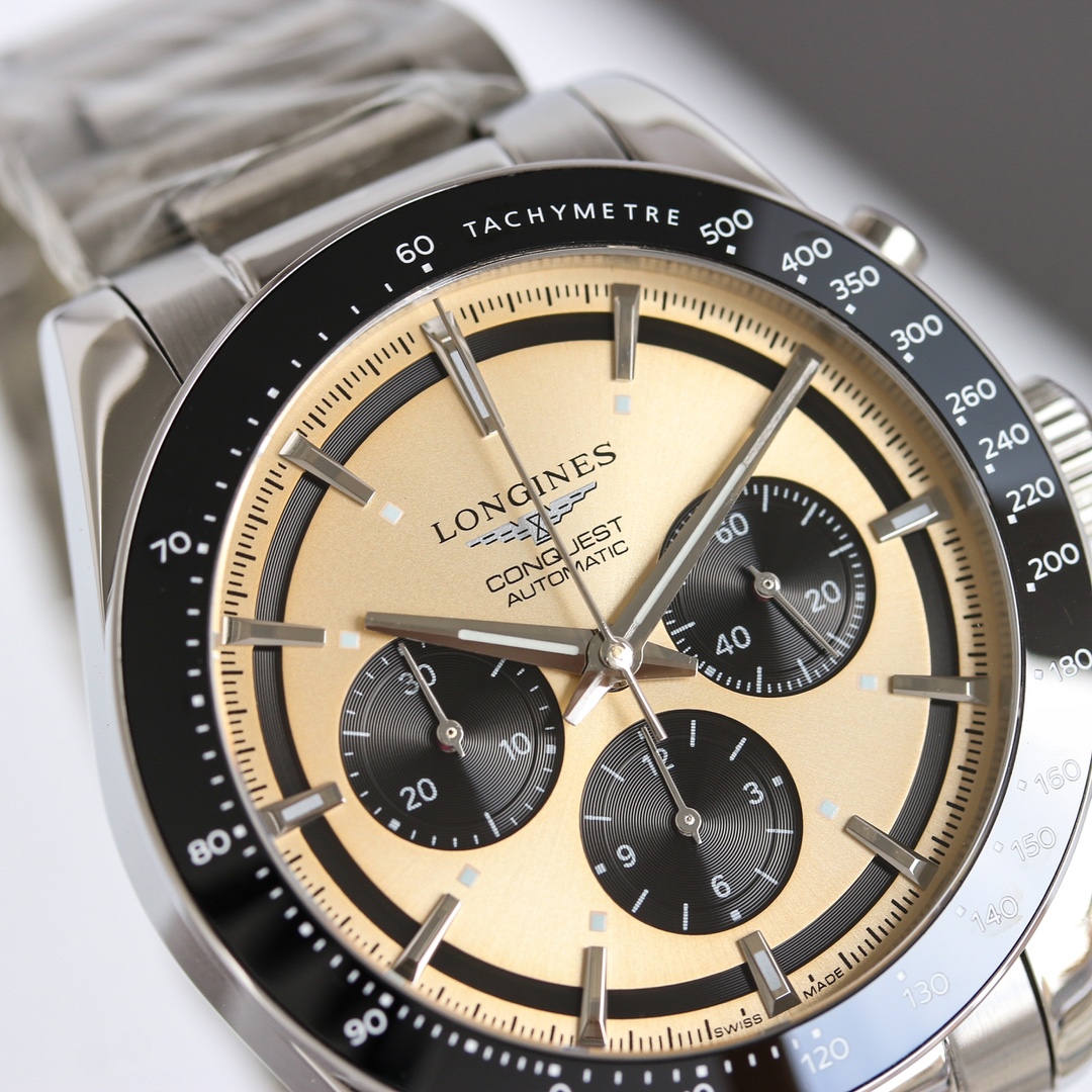 Longines Conquest Chronograph L3.835.4.32.6 stainless steel case and bracelet, black bezel, champagne dial 42mm Men's Automatic