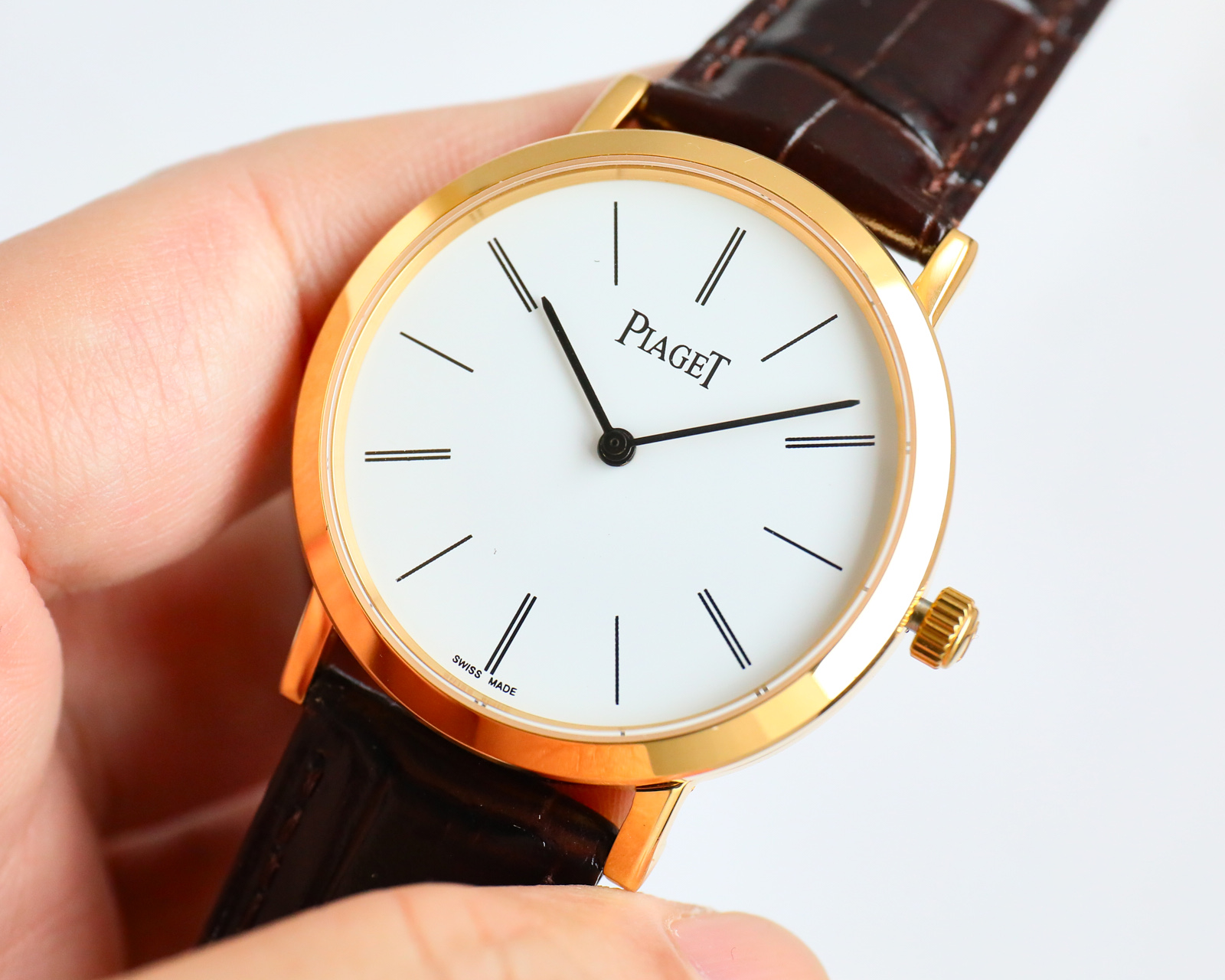 Piaget Altiplano silver case bezel, white dial, black leather strap 38mm Men's Mechanical