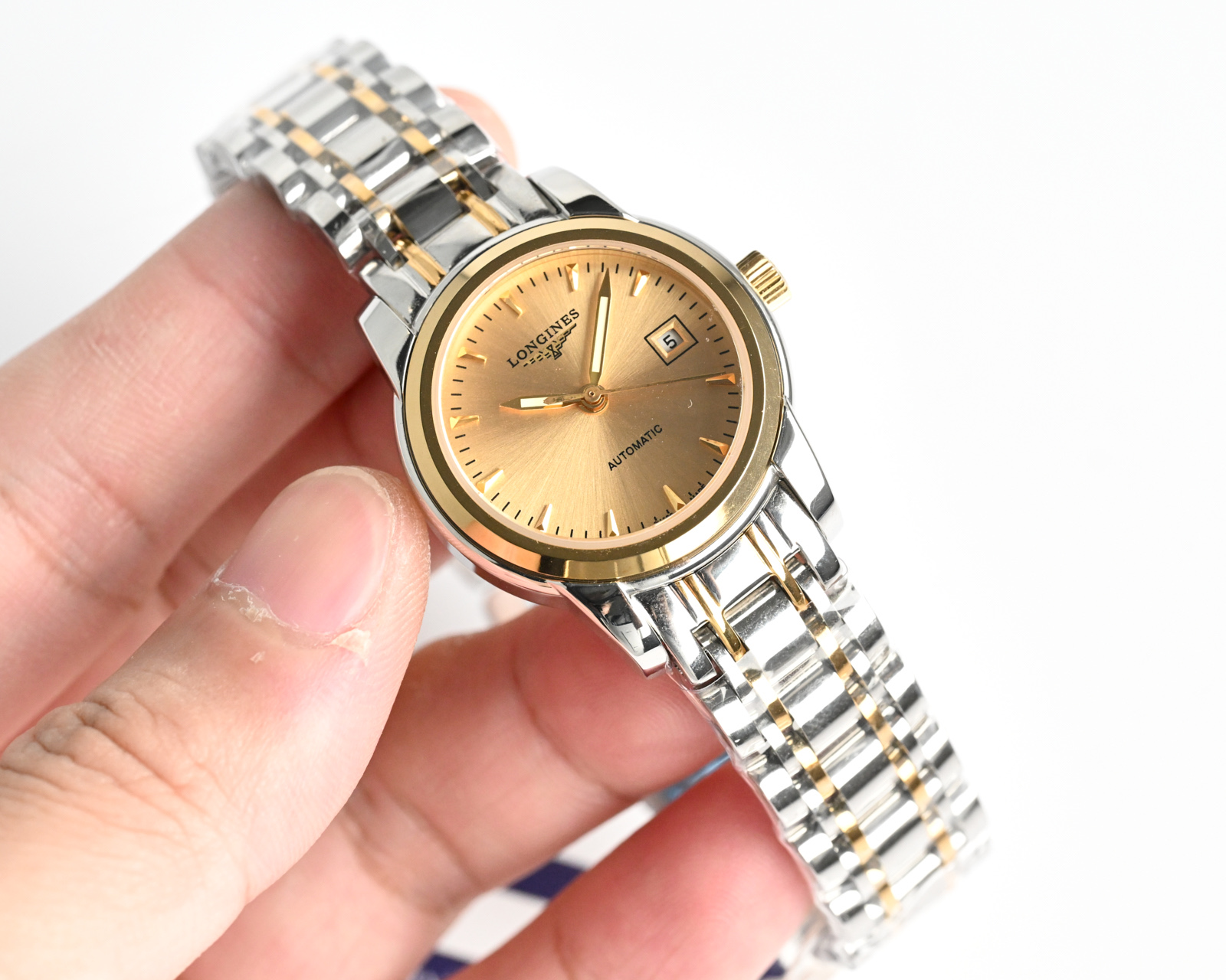 Longines Presence Automatic two-tone stainless steel and yellow gold case / bezel, champagne dial, two-tone bracelet 26mm Women's Automatic
