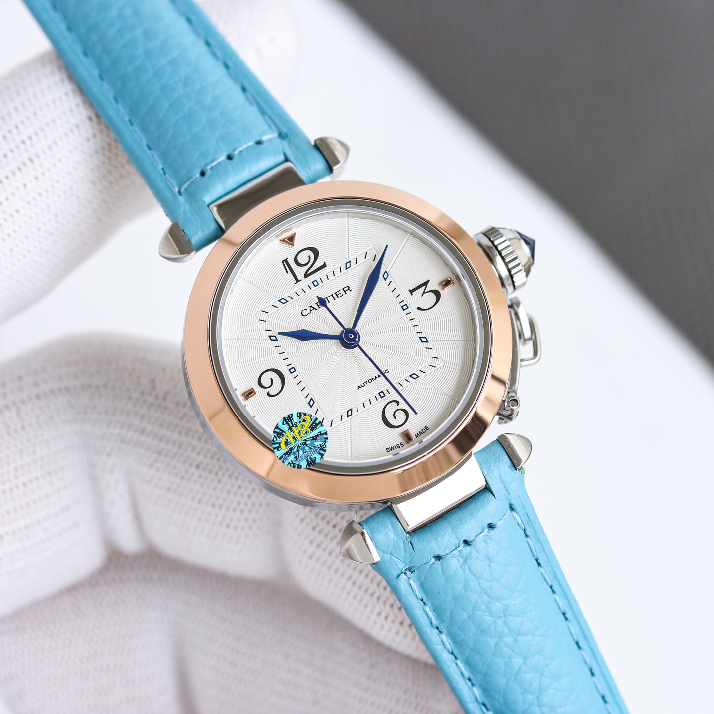 Cartier Pasha de Cartier stainless steel case and bezel, silver guilloche dial, blue leather strap 32mm Unisex Automatic