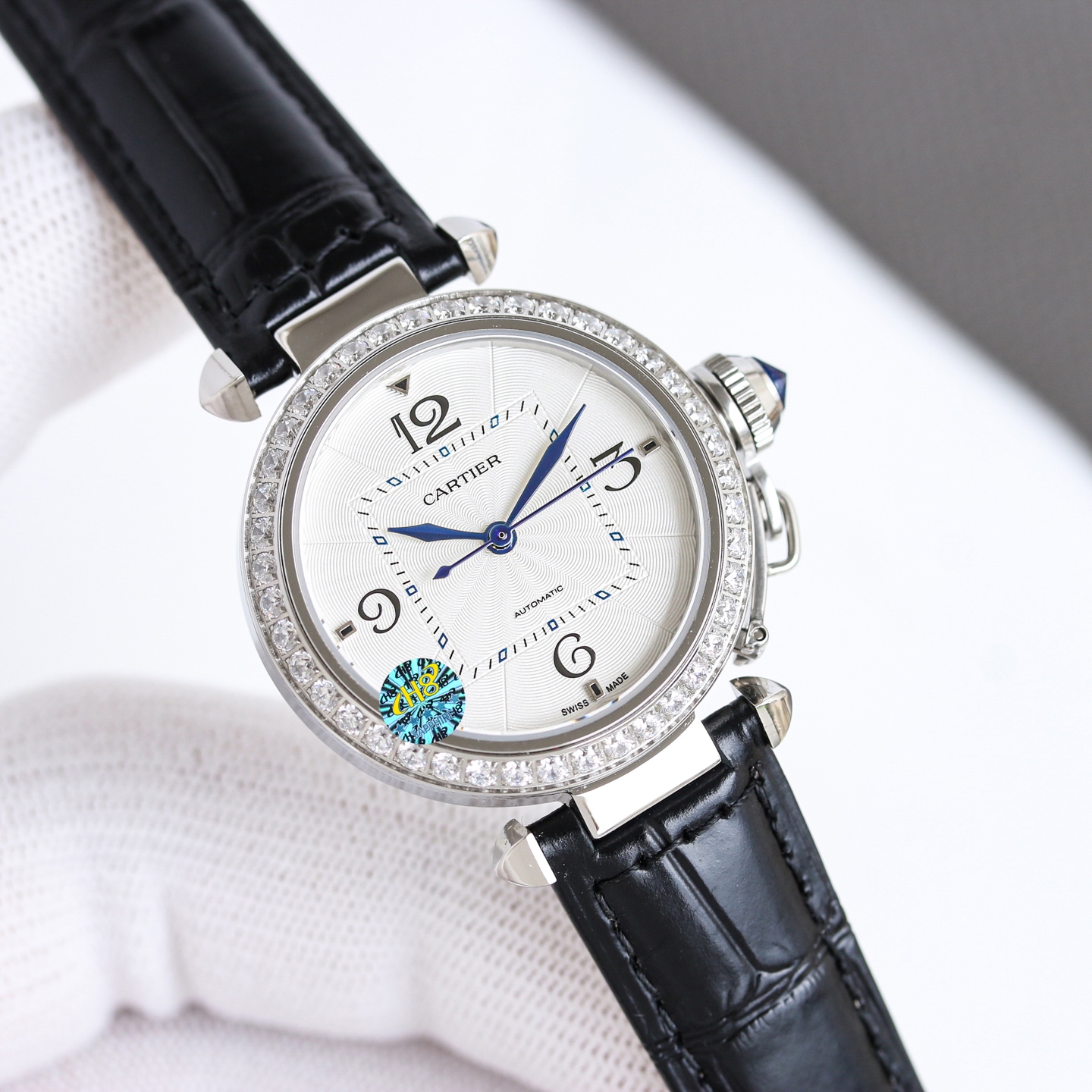 Cartier Pasha de Cartier stainless steel case and bezel, silver guilloche dial, blue leather strap 32mm Unisex Automatic