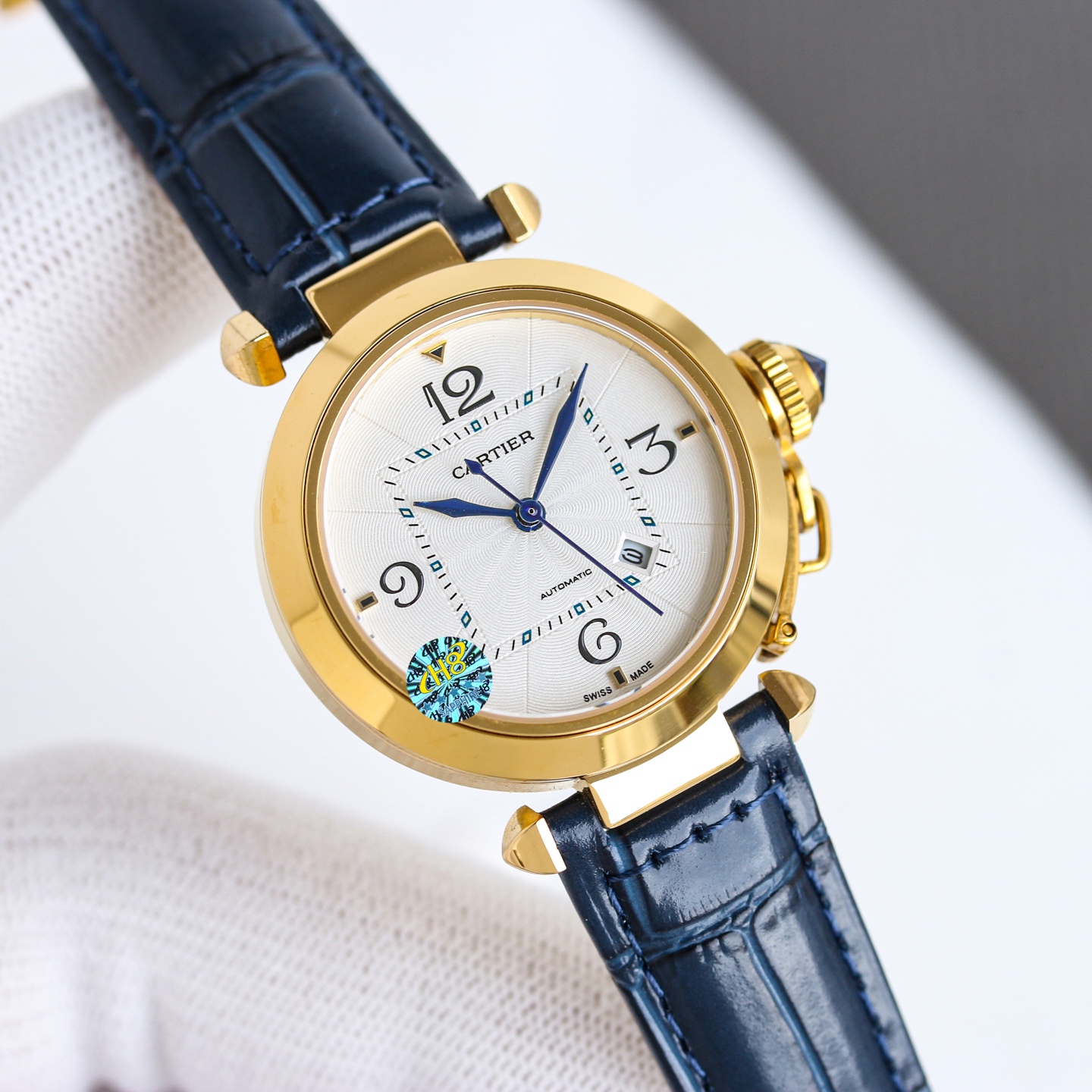 Cartier Pasha de Cartier 32mm stainless steel case, silver guilloche dial, blue leather strap 32mm Women's Automatic
