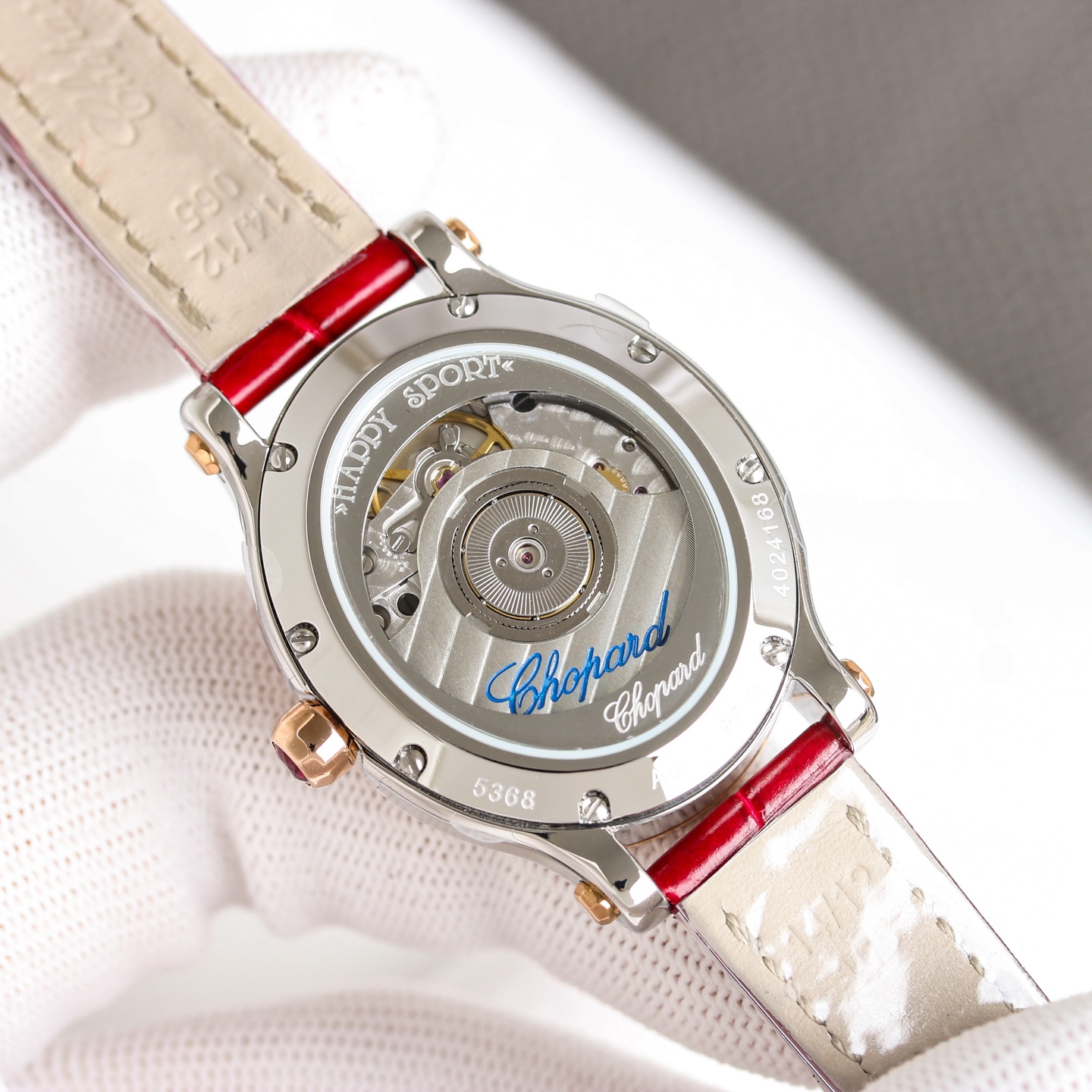 Chopard Happy Sport 278602-6005 stainless steel and rose gold diamond bezel, red dial, red leather strap 33mm Women's Automatic