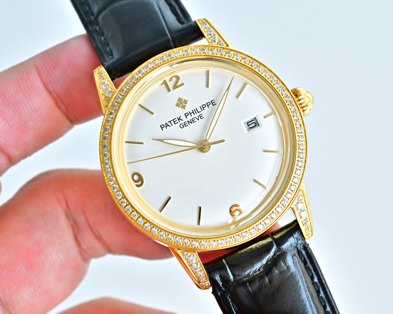 Patek Philippe Calatrava 4897 / 300G white gold diamond-set case and bezel, silver dial, black leather strap 33mm Women's Automatic
