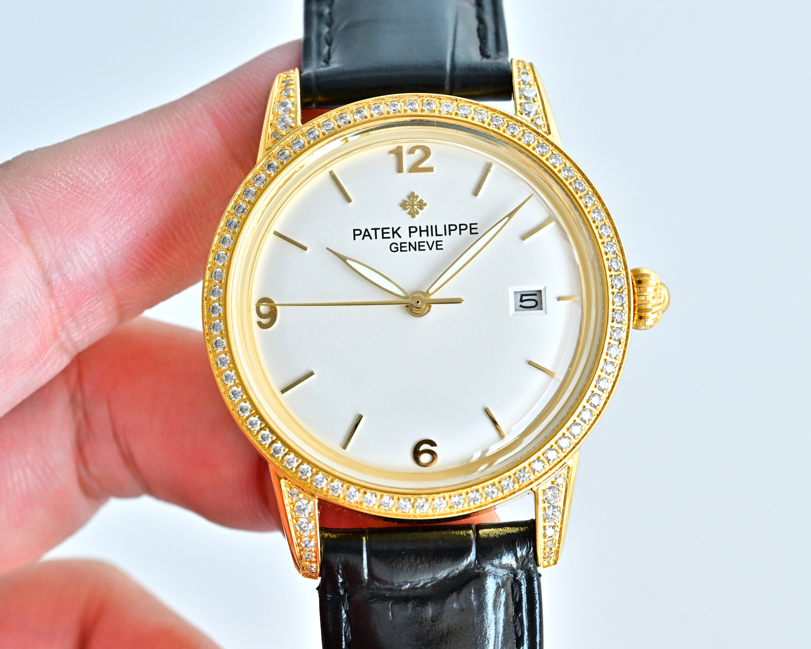 Patek Philippe Calatrava 4897 / 300G white gold diamond-set case and bezel, silver dial, black leather strap 33mm Women's Automatic