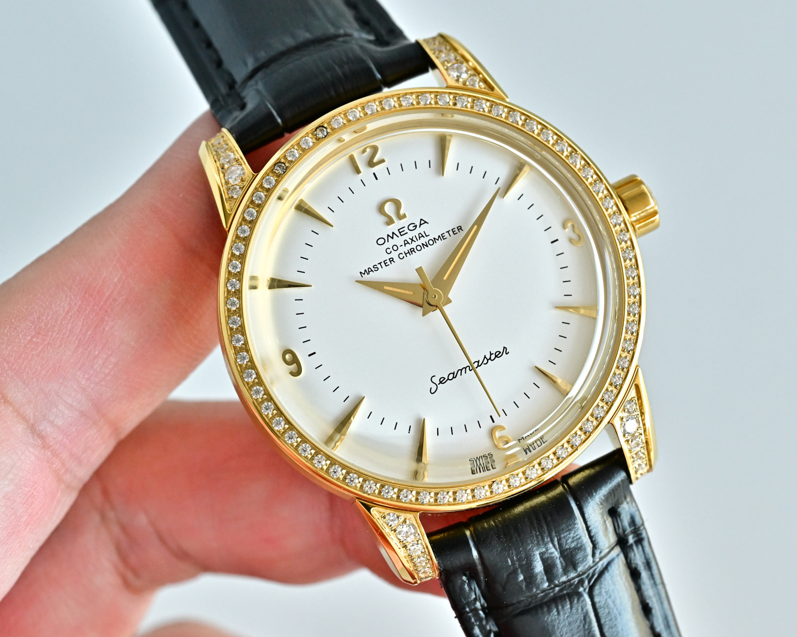 Omega Seamaster 1948 silver case / diamond bezel and lugs / white dial / blue leather strap 39mm Men's Automatic
