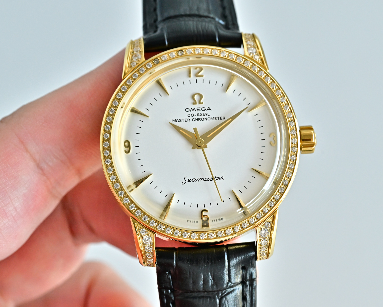 Omega Seamaster 1948 silver case / diamond bezel and lugs / white dial / blue leather strap 39mm Men's Automatic