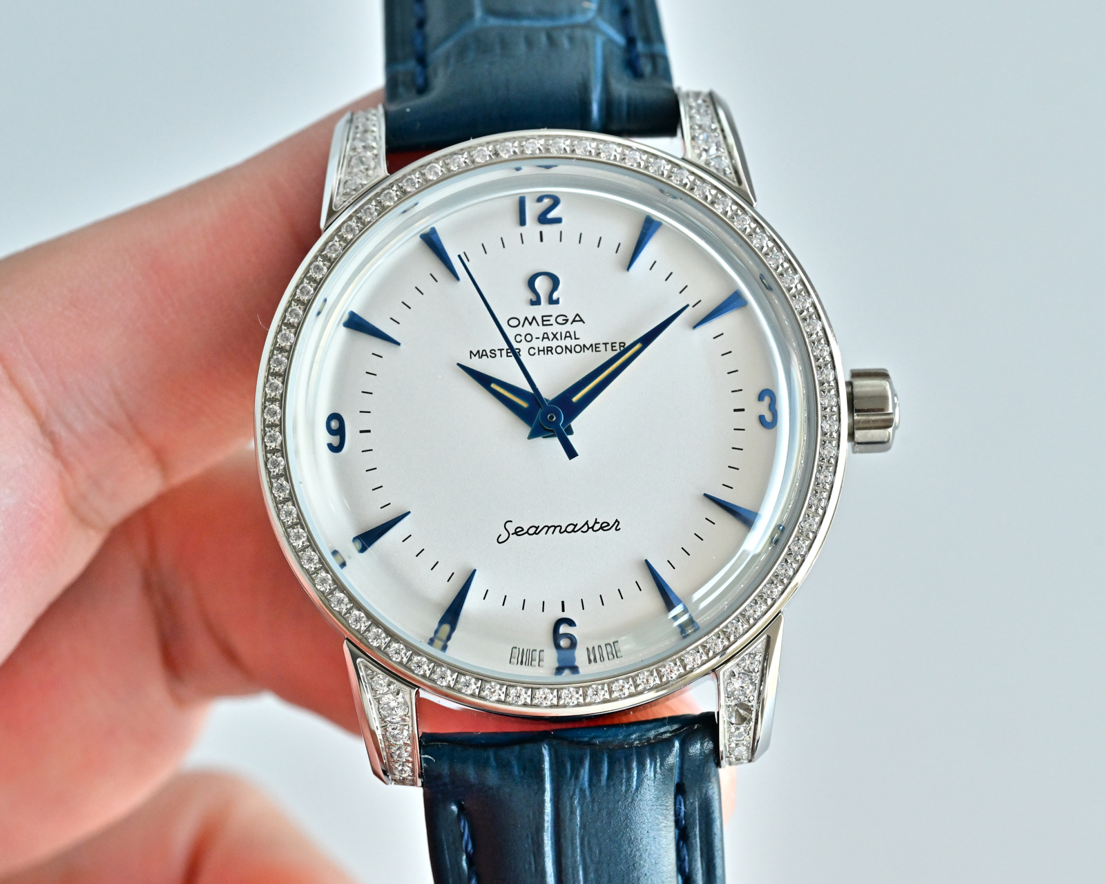 Omega Seamaster 1948 silver case / diamond bezel and lugs / white dial / blue leather strap 39mm Men's Automatic