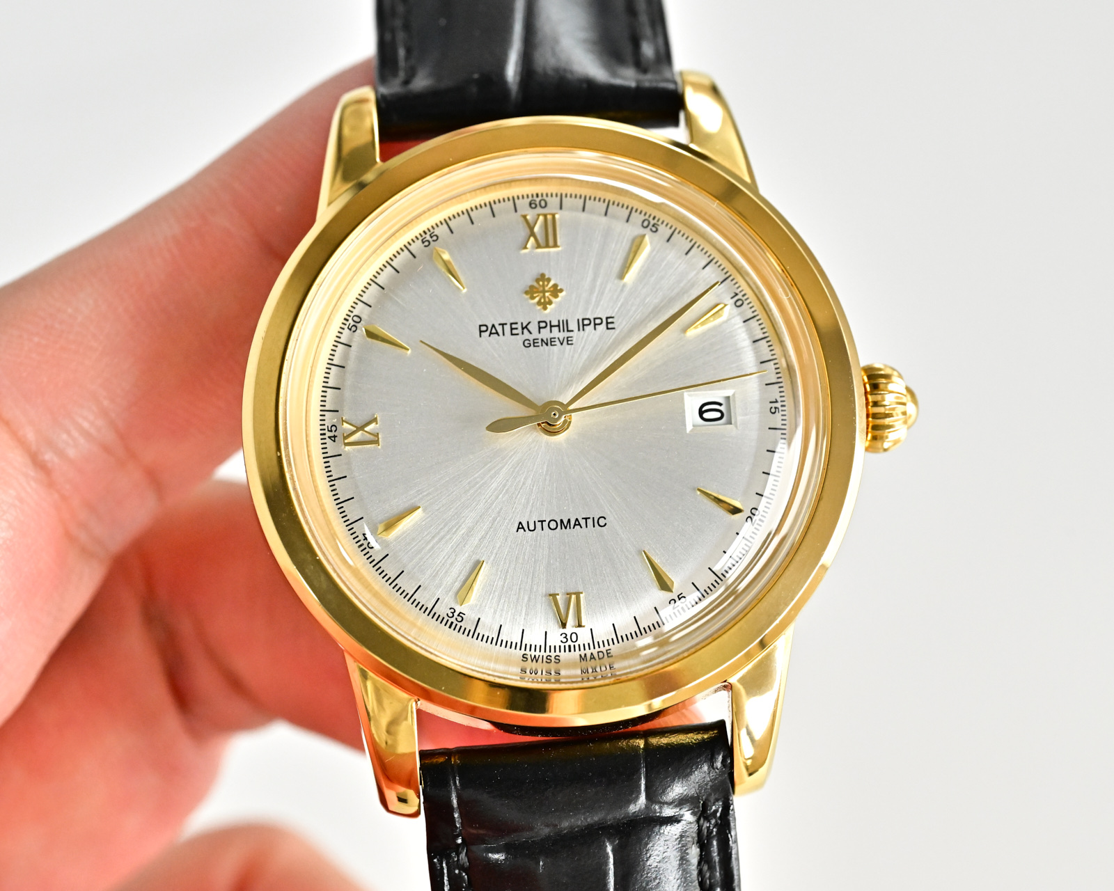Patek Philippe Calatrava Date yellow gold case, silver dial, black leather strap 39mm Men's Automatic