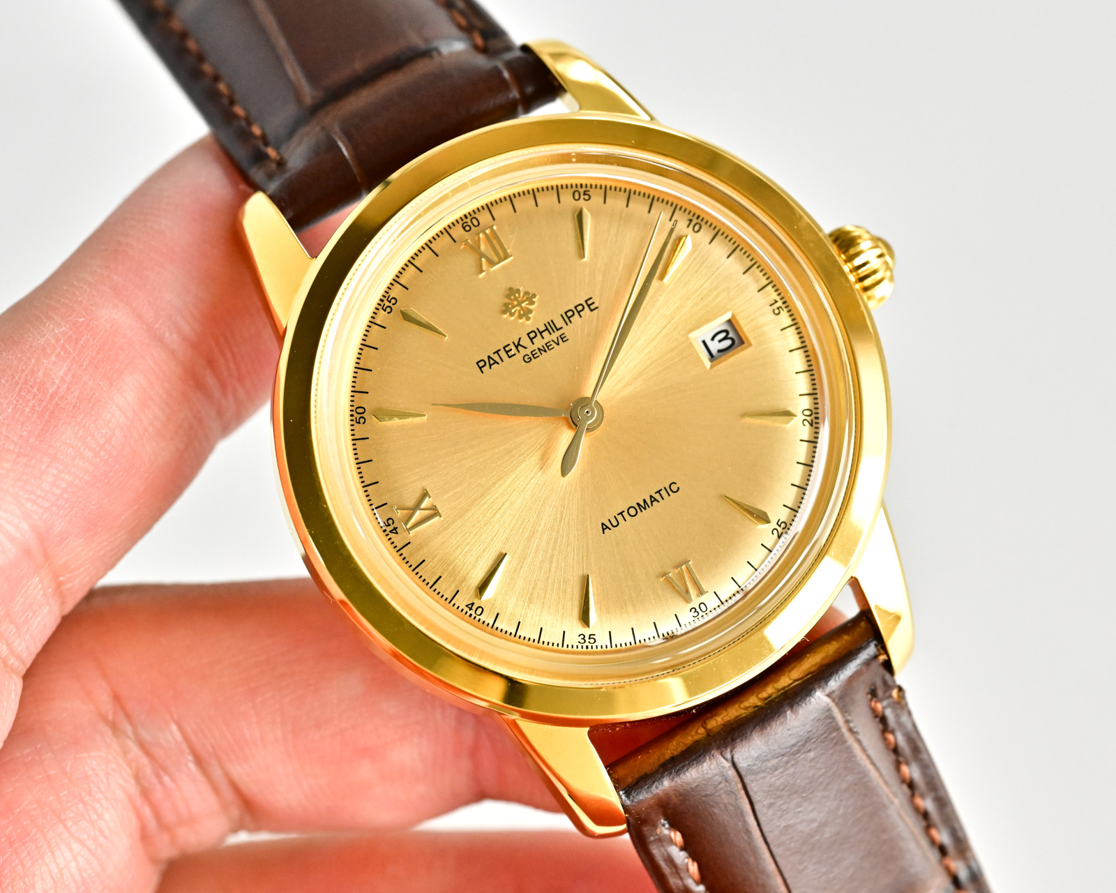 Patek Philippe Calatrava Date yellow gold case, silver dial, black leather strap 39mm Men's Automatic