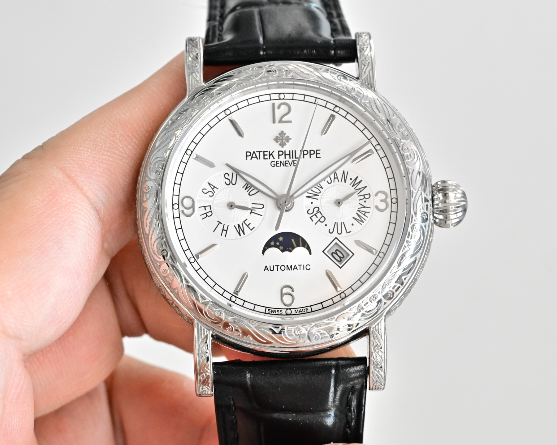 Patek Philippe Complications Annual Calendar Moon Phases 4968G white gold diamond-set case bezel, black dial, black leather strap 42mm Women's Automatic