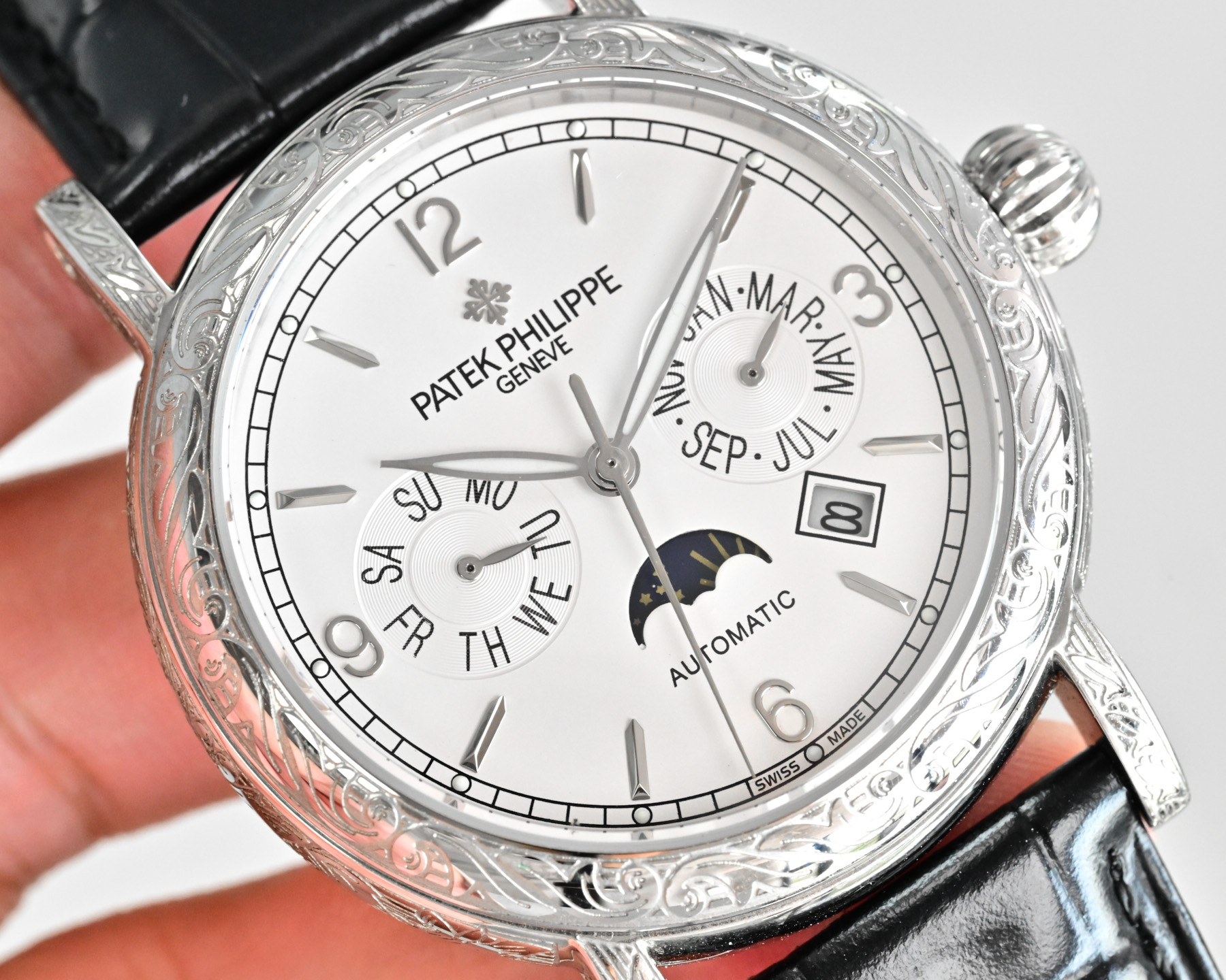 Patek Philippe Complications Annual Calendar Moon Phases 4968G white gold diamond-set case bezel, black dial, black leather strap 42mm Women's Automatic