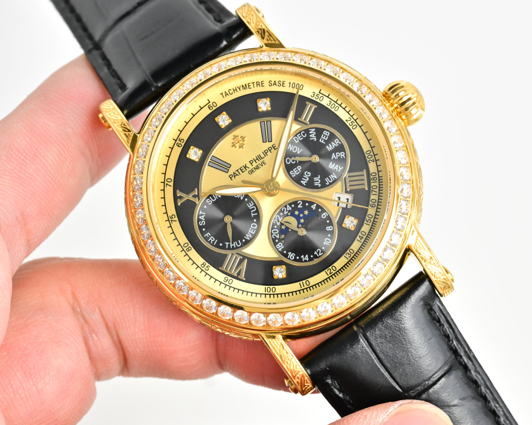 Patek Philippe Grandi Complicazioni Cronografo Calendario Perpetuo cassa in oro, lunetta con diamanti, quadrante bianco, cinturino in pelle nera 42 mm Automatico da uomo