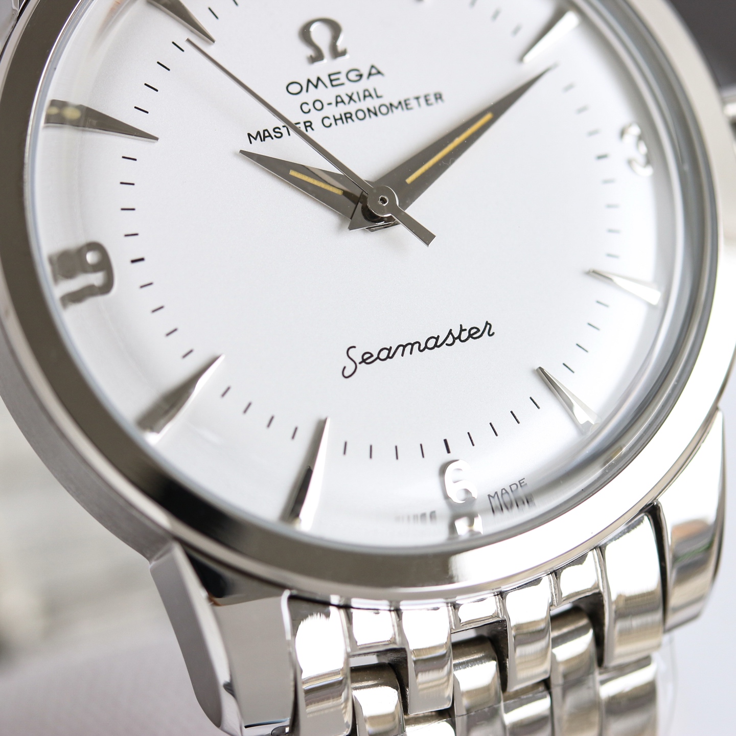 Omega Seamaster 1948 silver stainless steel case, bezel, and bracelet; white dial 39mm Men's Automatic