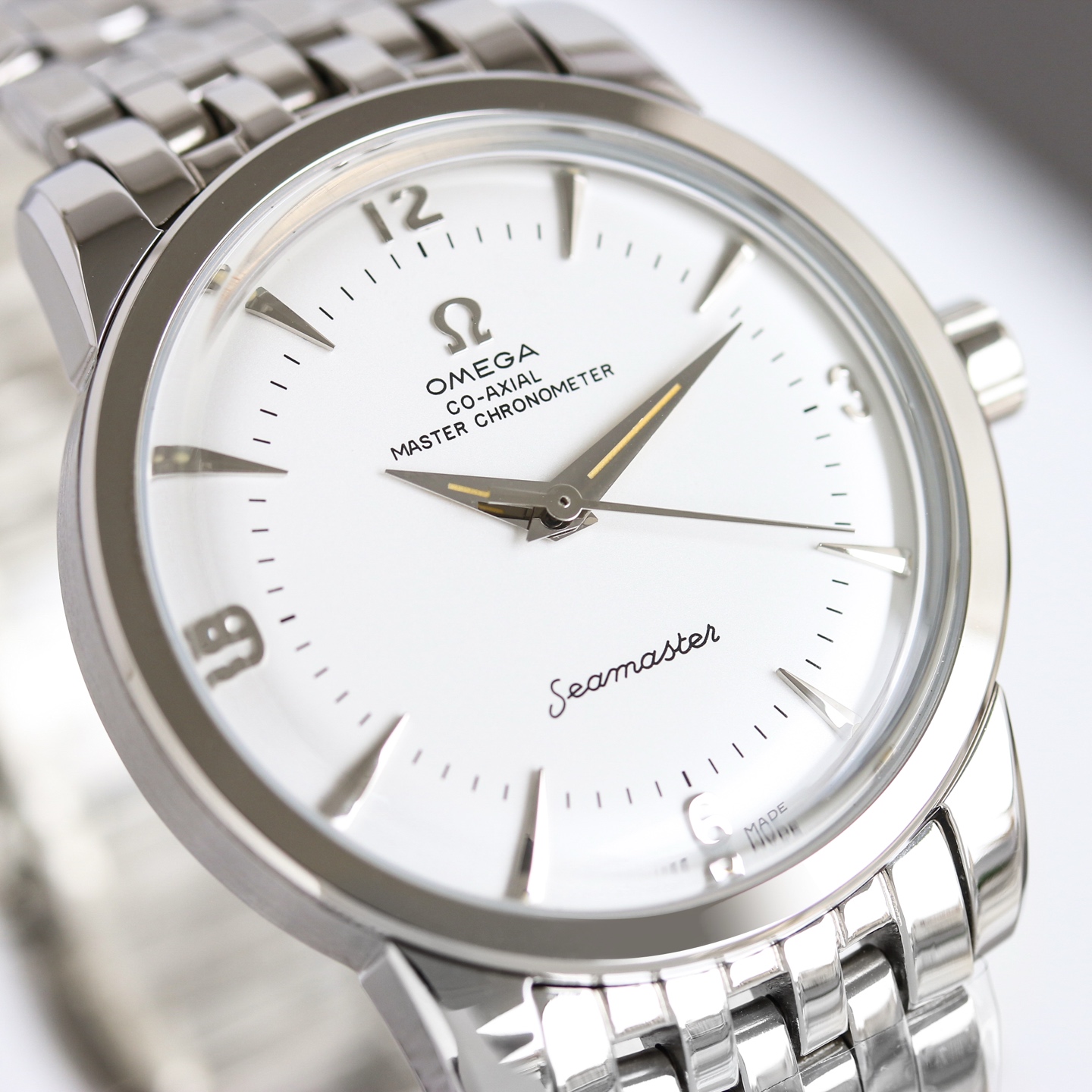 Omega Seamaster 1948 silver stainless steel case, bezel, and bracelet; white dial 39mm Men's Automatic