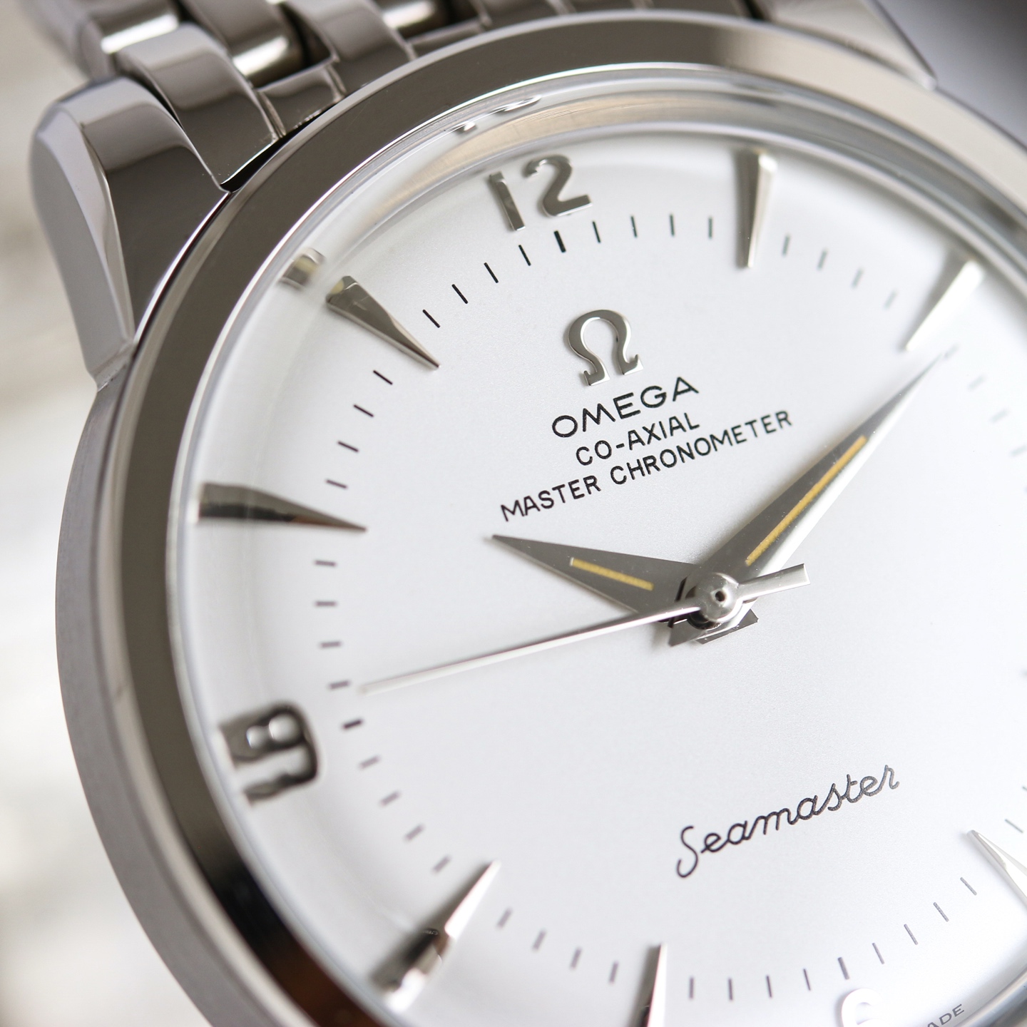 Omega Seamaster 1948 silver stainless steel case, bezel, and bracelet; white dial 39mm Men's Automatic