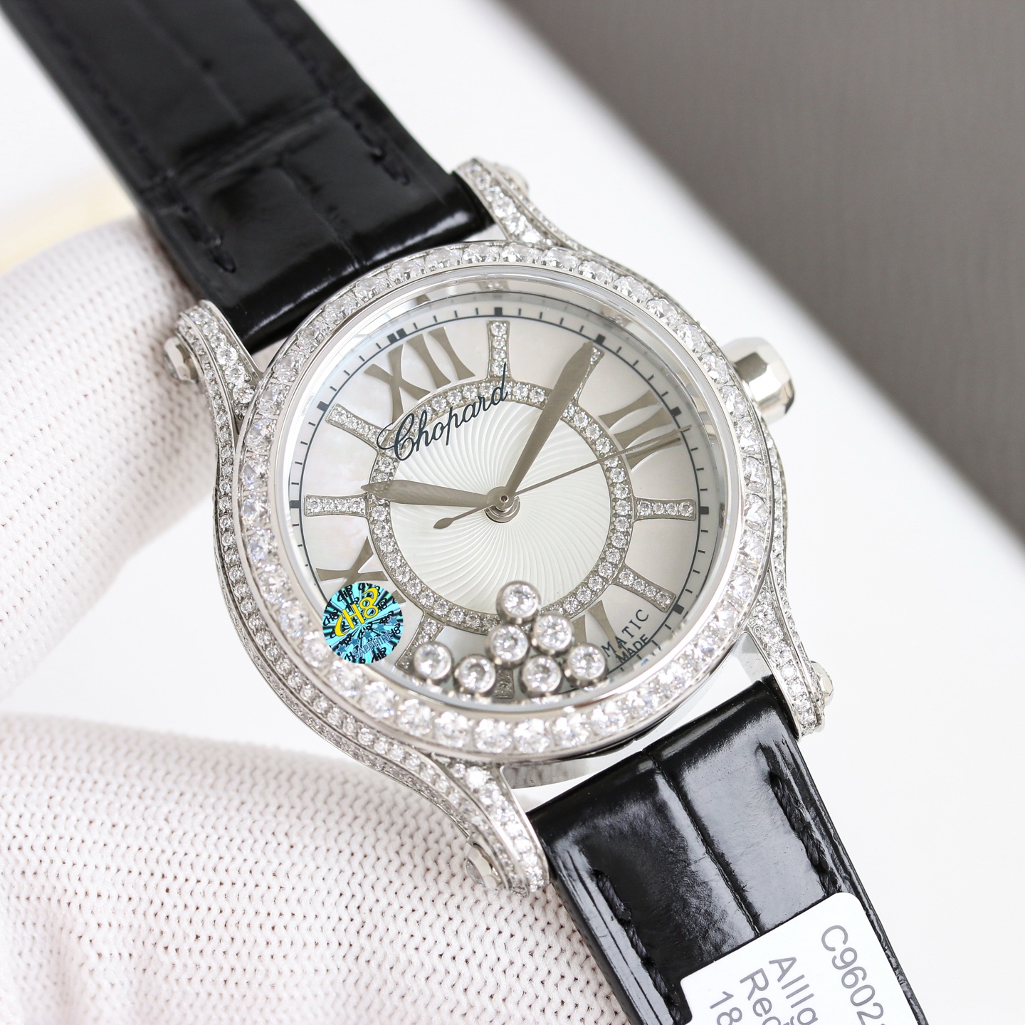 Chopard Happy Diamonds 274302-1001 white gold diamond-set case and bezel, silver dial, black leather strap 36mm Women's Quartz
