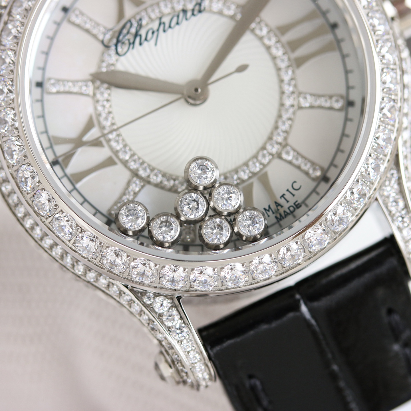 Chopard Happy Diamonds 274302-1001 white gold diamond-set case and bezel, silver dial, black leather strap 36mm Women's Quartz