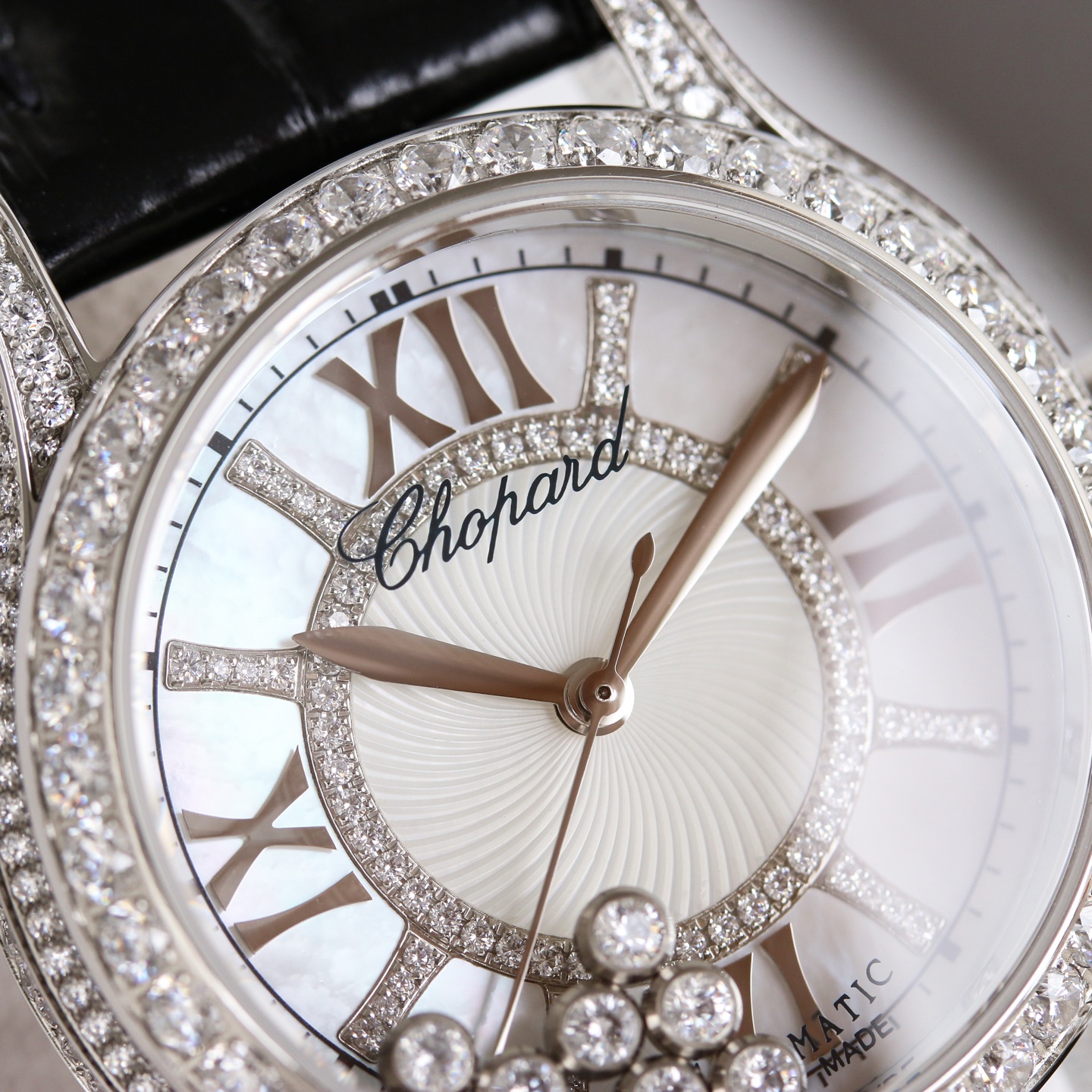 Chopard Happy Diamonds 274302-1001 white gold diamond-set case and bezel, silver dial, black leather strap 36mm Women's Quartz