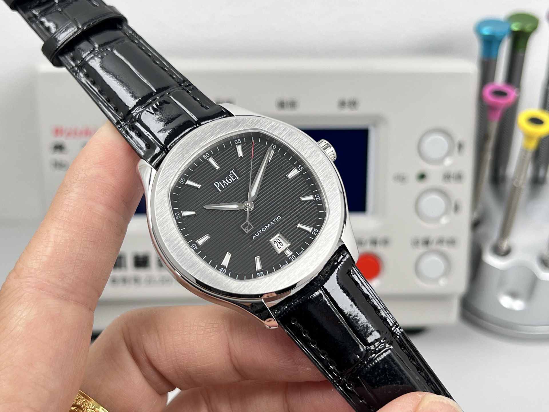 Piaget Polo Date stainless steel case and bezel, black dial, brown leather strap 36mm Unisex Automatic