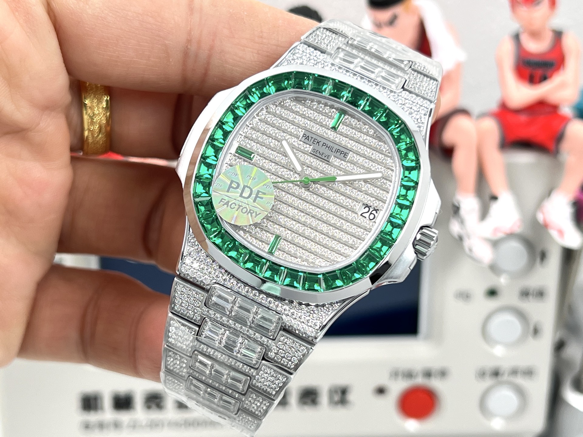 Patek Philippe Nautilus Date 5711 / 1300A Custom Diamond Emerald Bezel silver case and bracelet, green bezel, silver diamond dial 40mm Men's Automatic