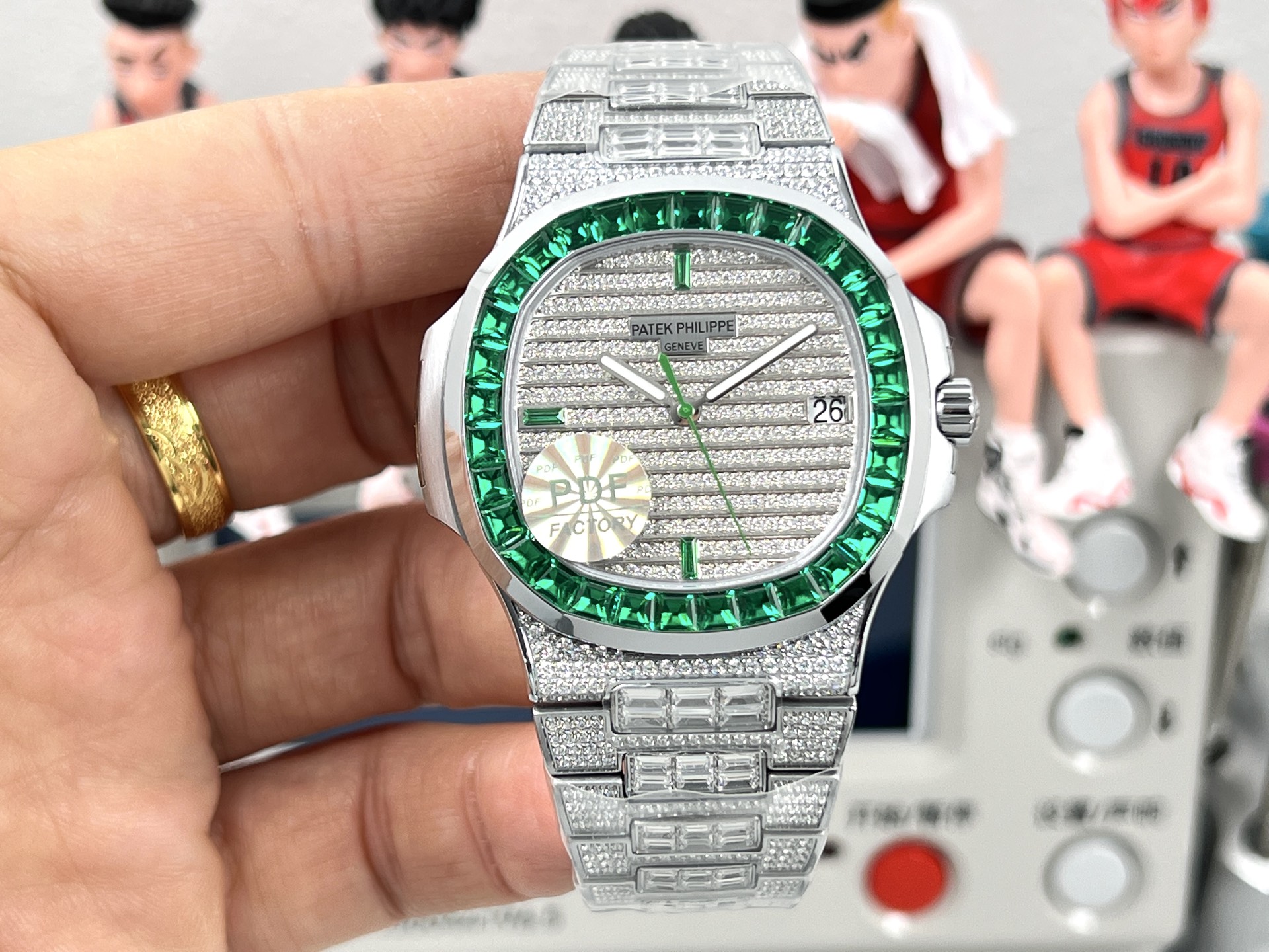 Patek Philippe Nautilus Date 5711 / 1300A Custom Diamond Emerald Bezel silver case and bracelet, green bezel, silver diamond dial 40mm Men's Automatic