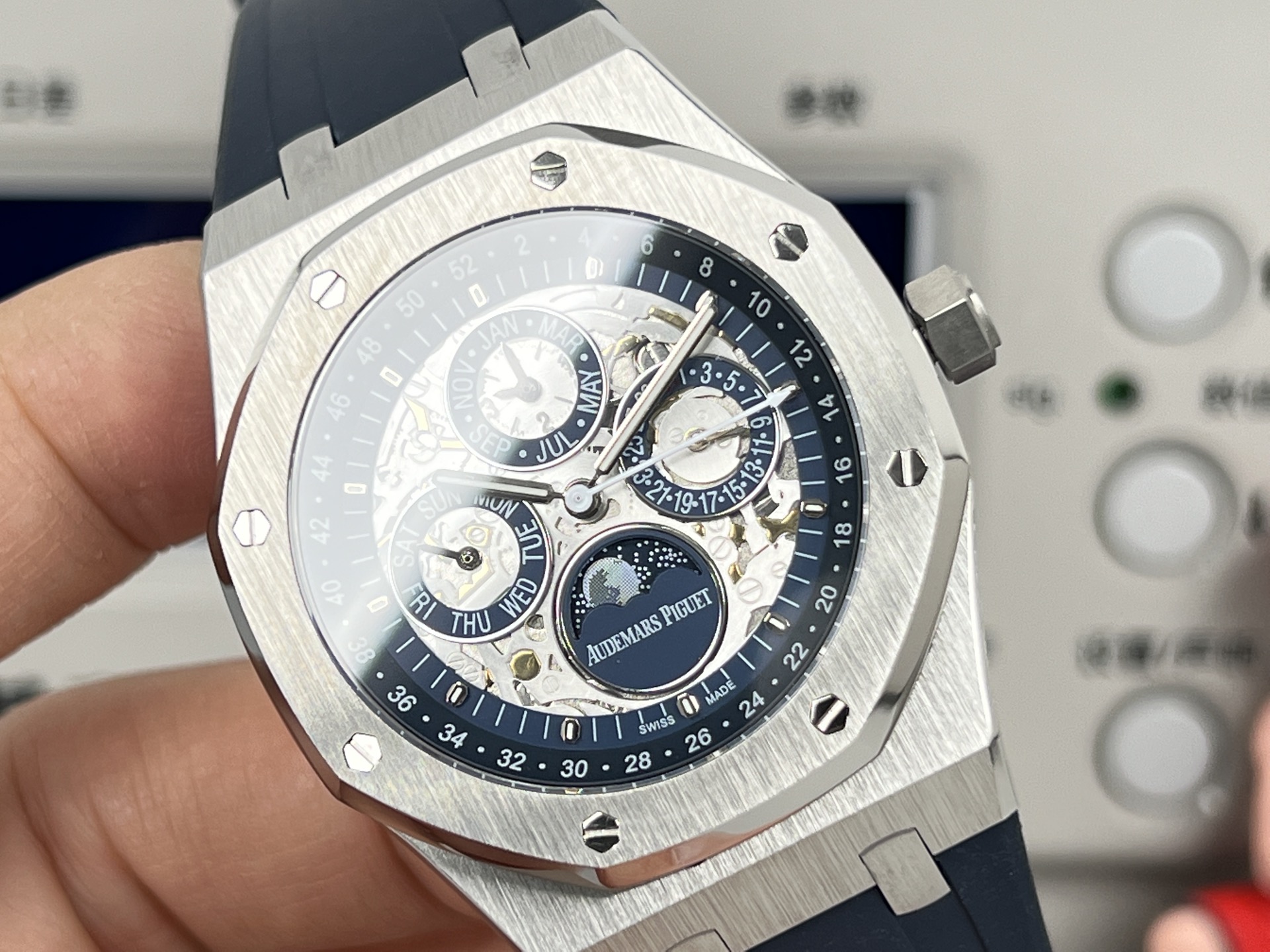 Audemars Piguet Royal Oak Perpetual Calendar Openworked 26574ST.OO.1220ST.01 stainless steel case and bezel, blue openworked dial, blue rubber strap 41mm Men's Automatic