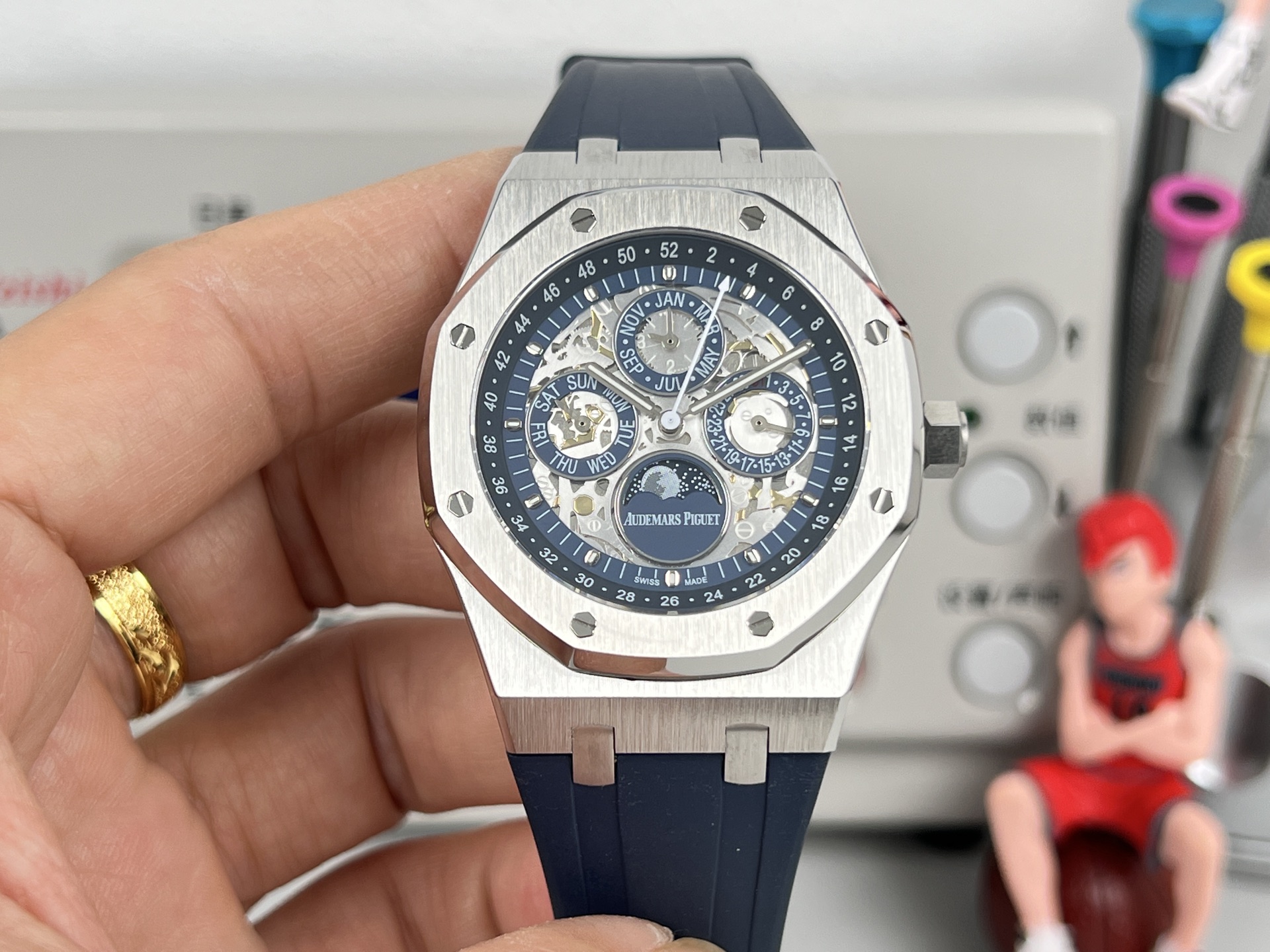 Audemars Piguet Royal Oak Perpetual Calendar Openworked 26574ST OO 1220ST 01 stainless steel case and bezel blue openworked dial blue rubber strap 41mm Men s Automatic | BUY...