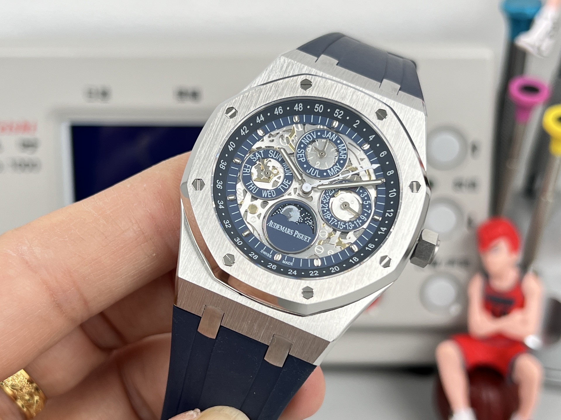 Audemars Piguet Royal Oak Perpetual Calendar Openworked 26574ST.OO.1220ST.01 stainless steel case and bezel, blue openworked dial, blue rubber strap 41mm Men's Automatic