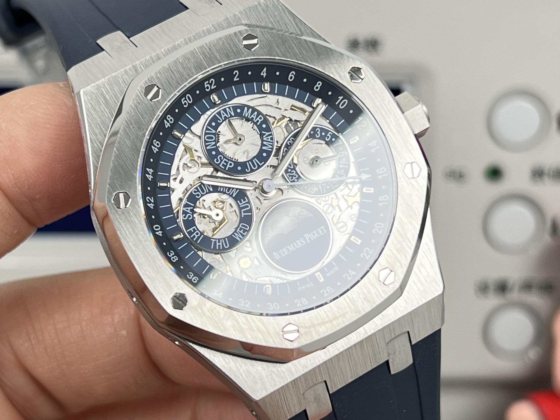 Audemars Piguet Royal Oak Perpetual Calendar Openworked 26574ST.OO.1220ST.01 stainless steel case and bezel, blue openworked dial, blue rubber strap 41mm Men's Automatic
