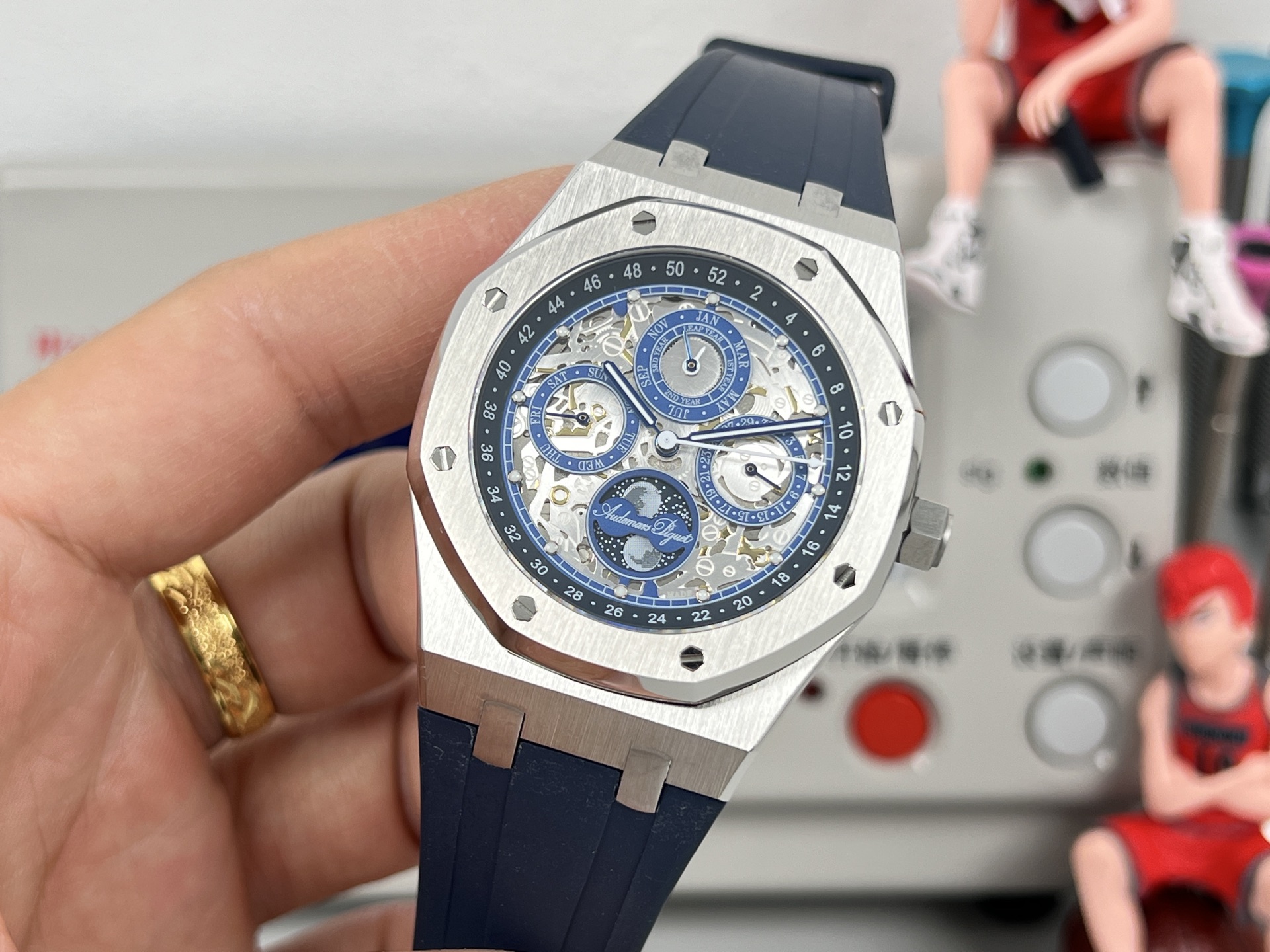 Audemars Piguet Royal Oak Perpetual Calendar Openworked 26574ST stainless steel case and bezel, blue skeleton dial, blue rubber strap 41mm Men's Automatic