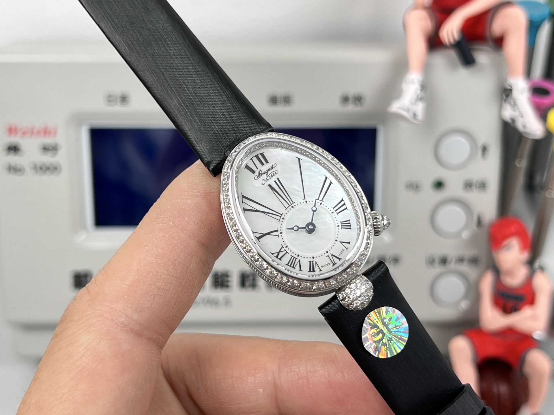 Breguet Reine de Naples 8928BB / 51 / 944 / DD0D3L White mother-of-pearl dial, diamond bezel, black leather strap, white gold case 33mm Women's Automatic
