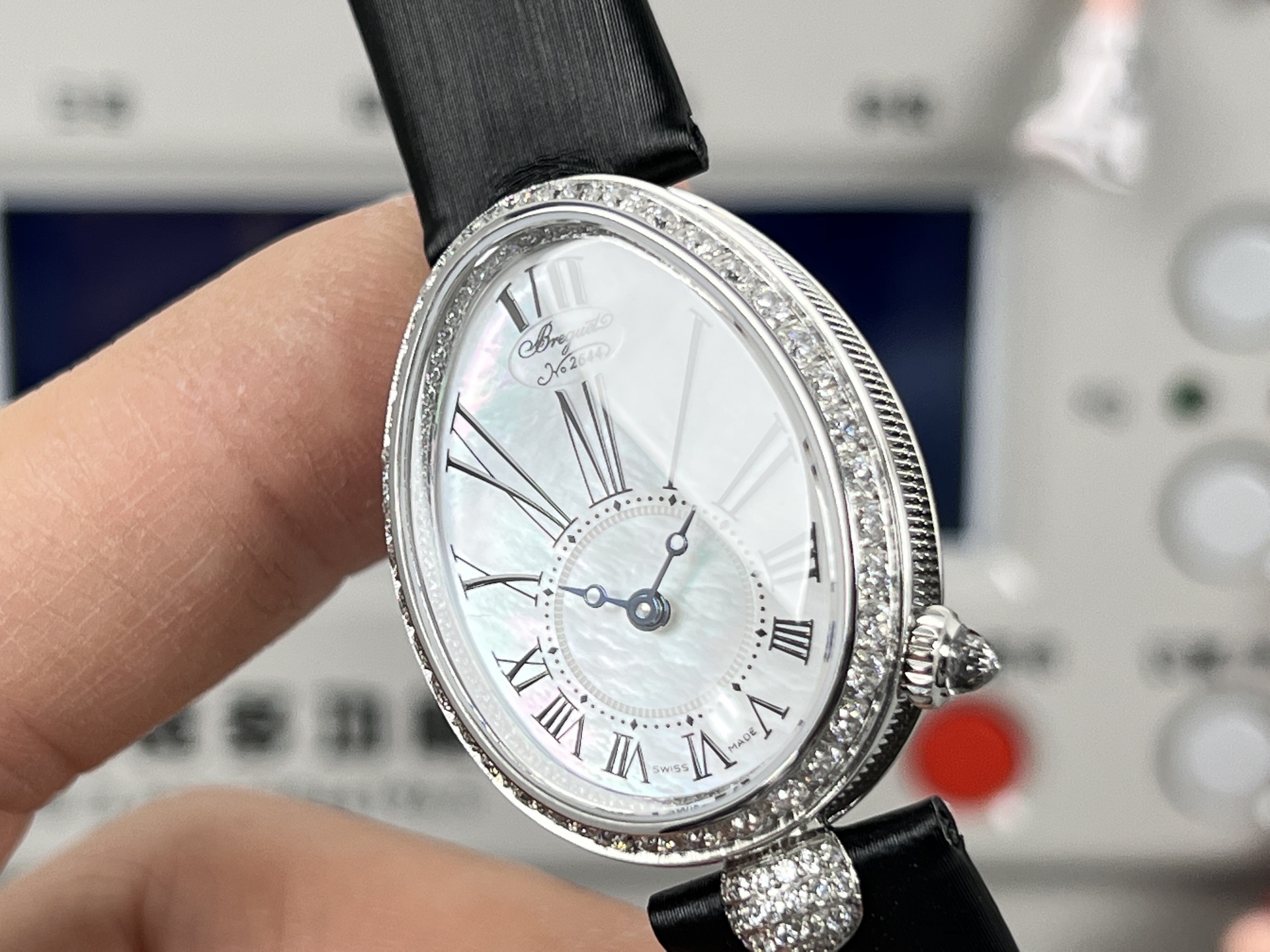 Breguet Reine de Naples 8928BB / 51 / 944 / DD0D3L White mother-of-pearl dial, diamond bezel, black leather strap, white gold case 33mm Women's Automatic