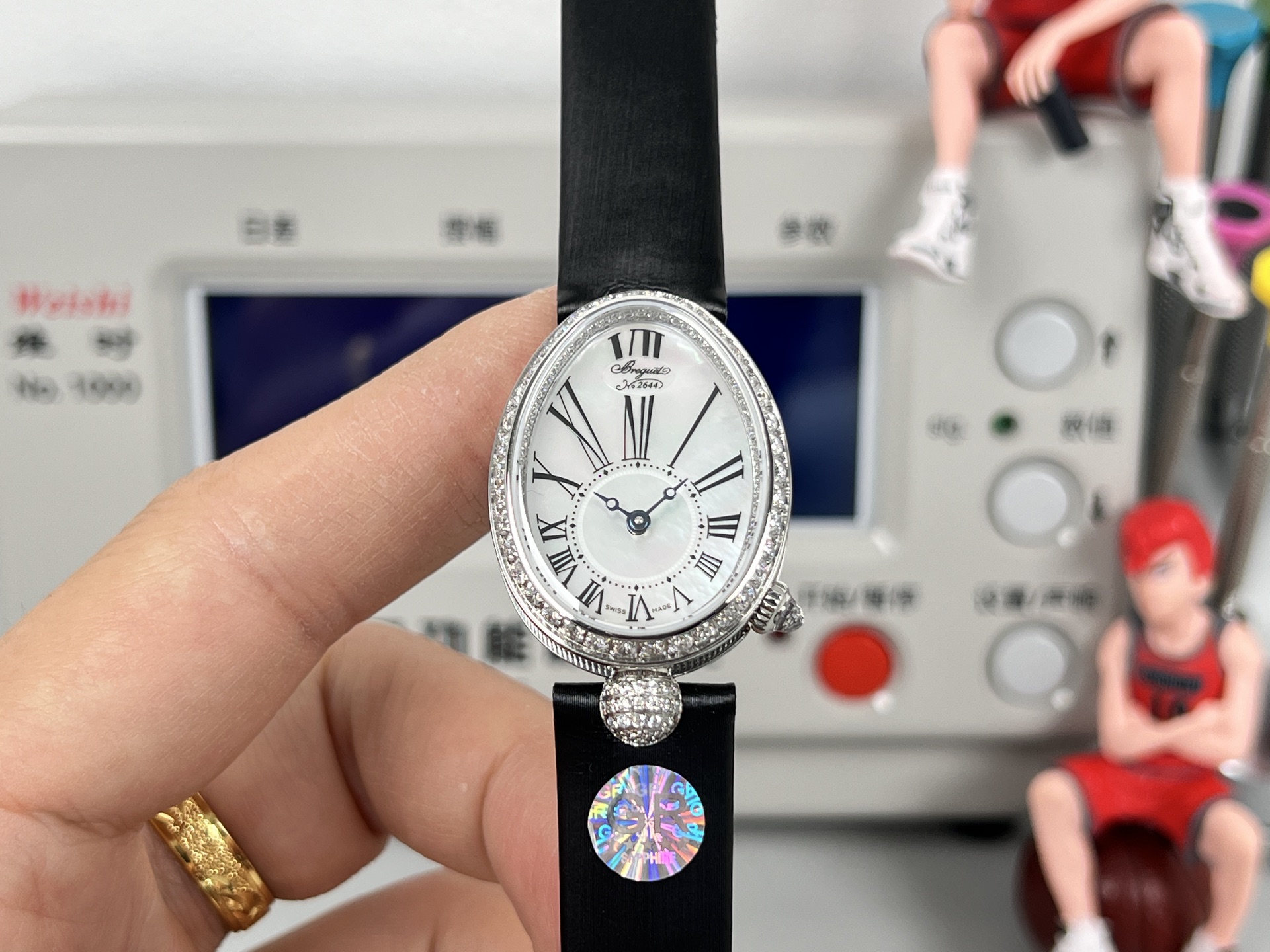 Breguet Reine de Naples 8928BB / 51 / 944 / DD0D3L White mother-of-pearl dial, diamond bezel, black leather strap, white gold case 33mm Women's Automatic