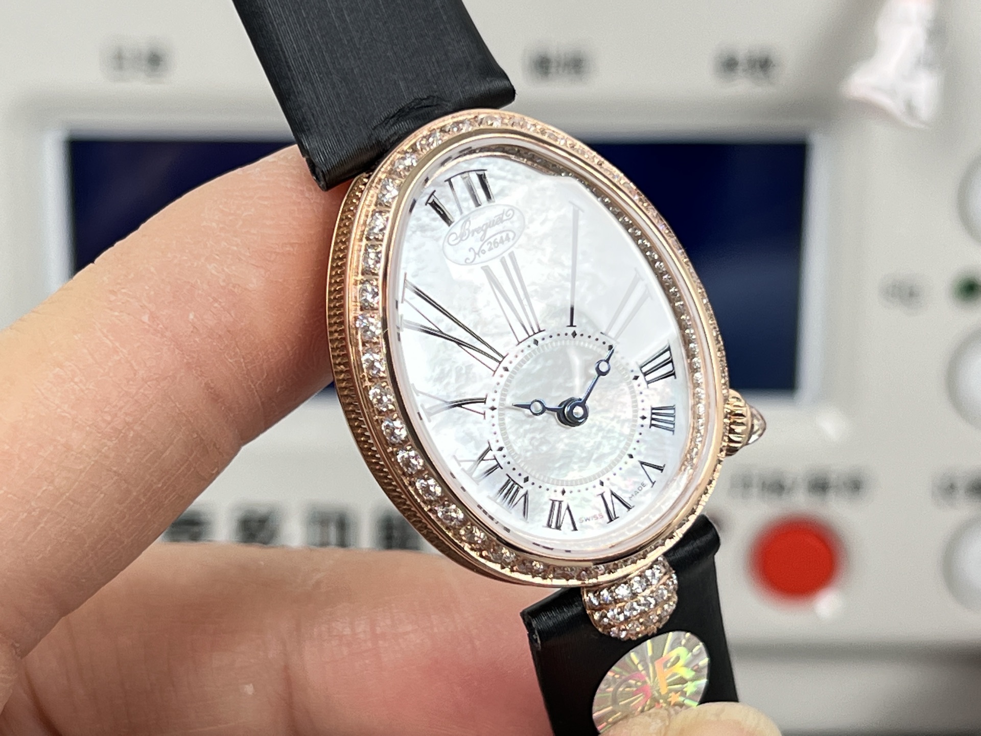 Breguet Reine de Naples 8928BR / 51 / 944 / DD0D3L rose gold case, diamond bezel, mother-of-pearl dial, black leather strap 33.5mm Women's Automatic