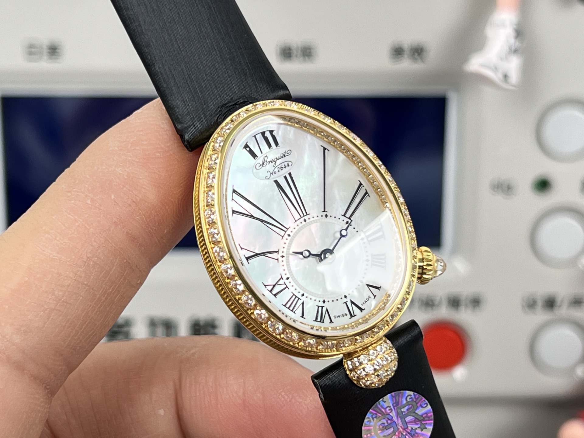 Breguet Reine de Naples 8928BA / 51 / 944 / DD0D3L yellow gold diamond-set bezel / case, white mother-of-pearl dial, black leather strap 33.5mm Women's Automatic